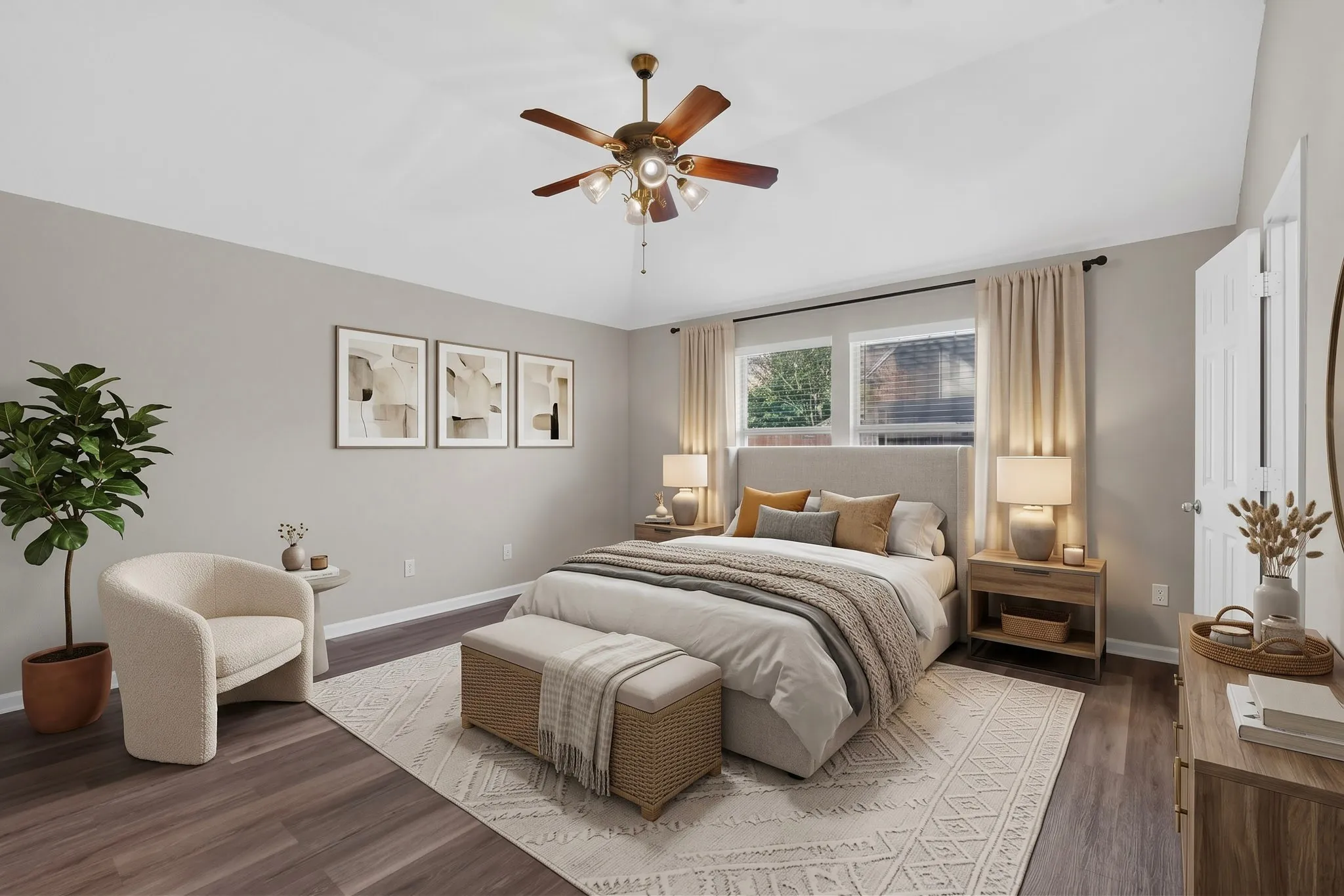 Vaulted ceiling with a ceiling fan, dual windows, and wood-finish flooring