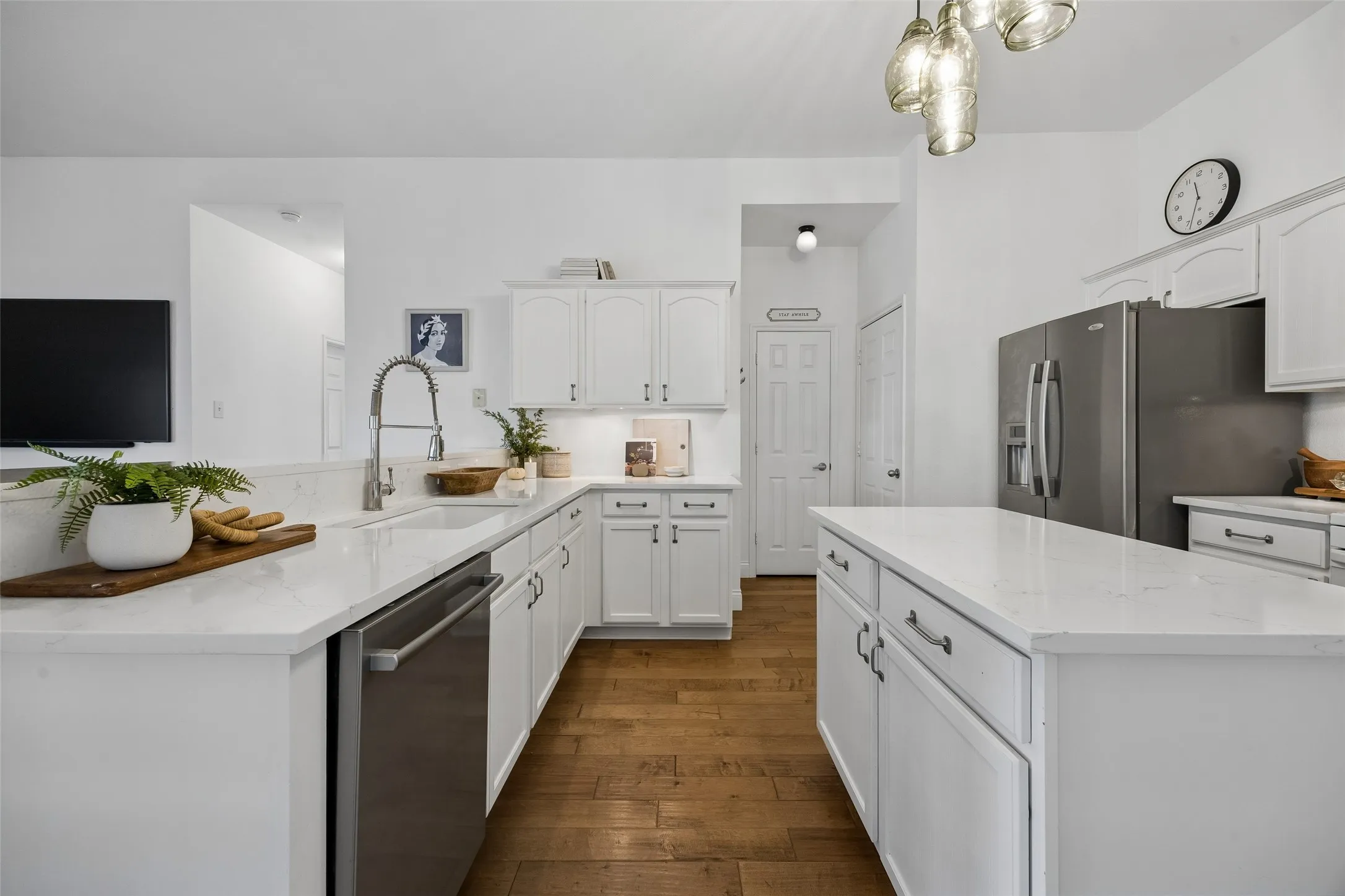 A subway tile backsplash and under cabinet lighting add style and function.