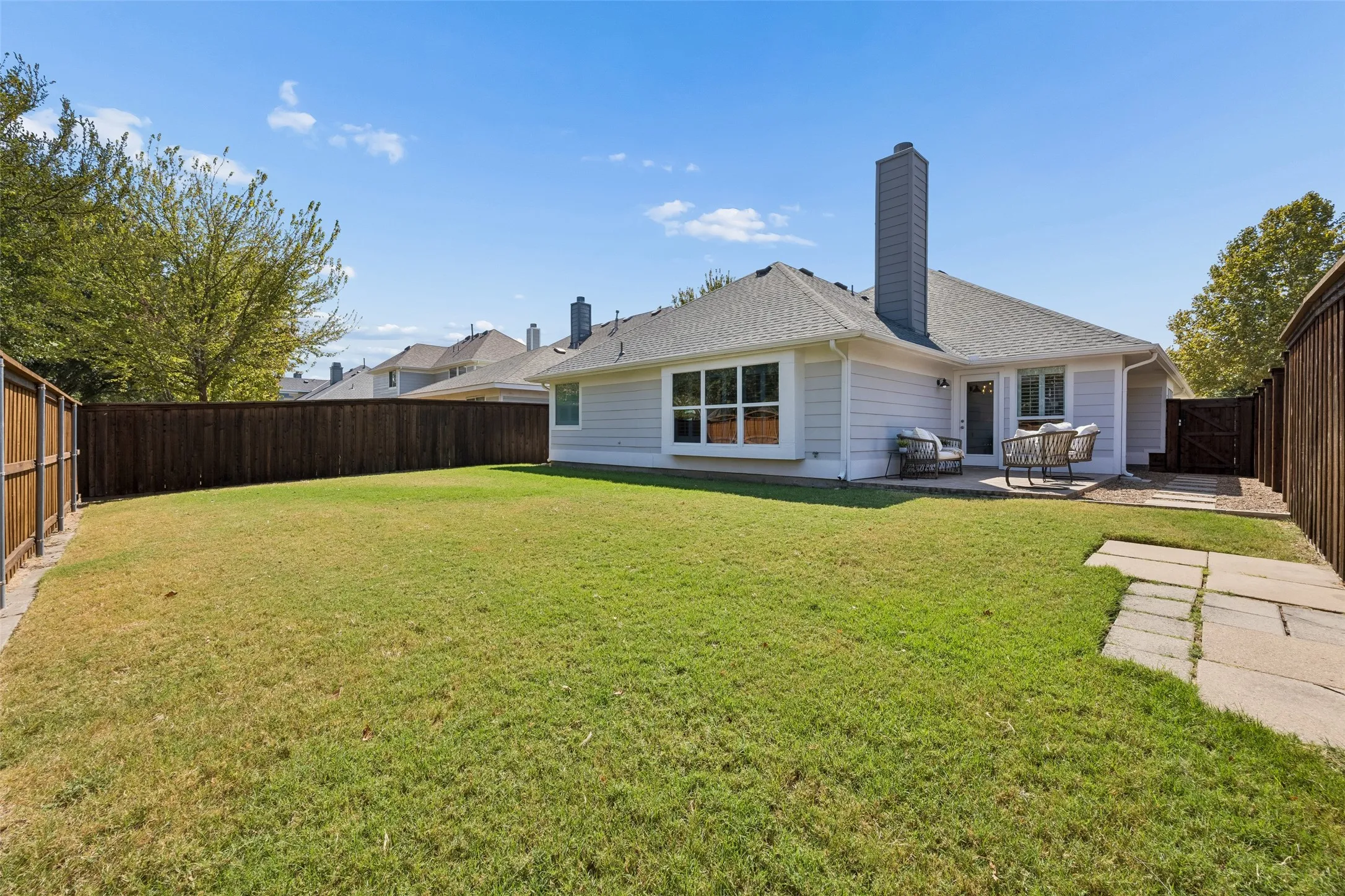 Large fenced backyard with plenty of room for pets, play and outdoor entertaining.