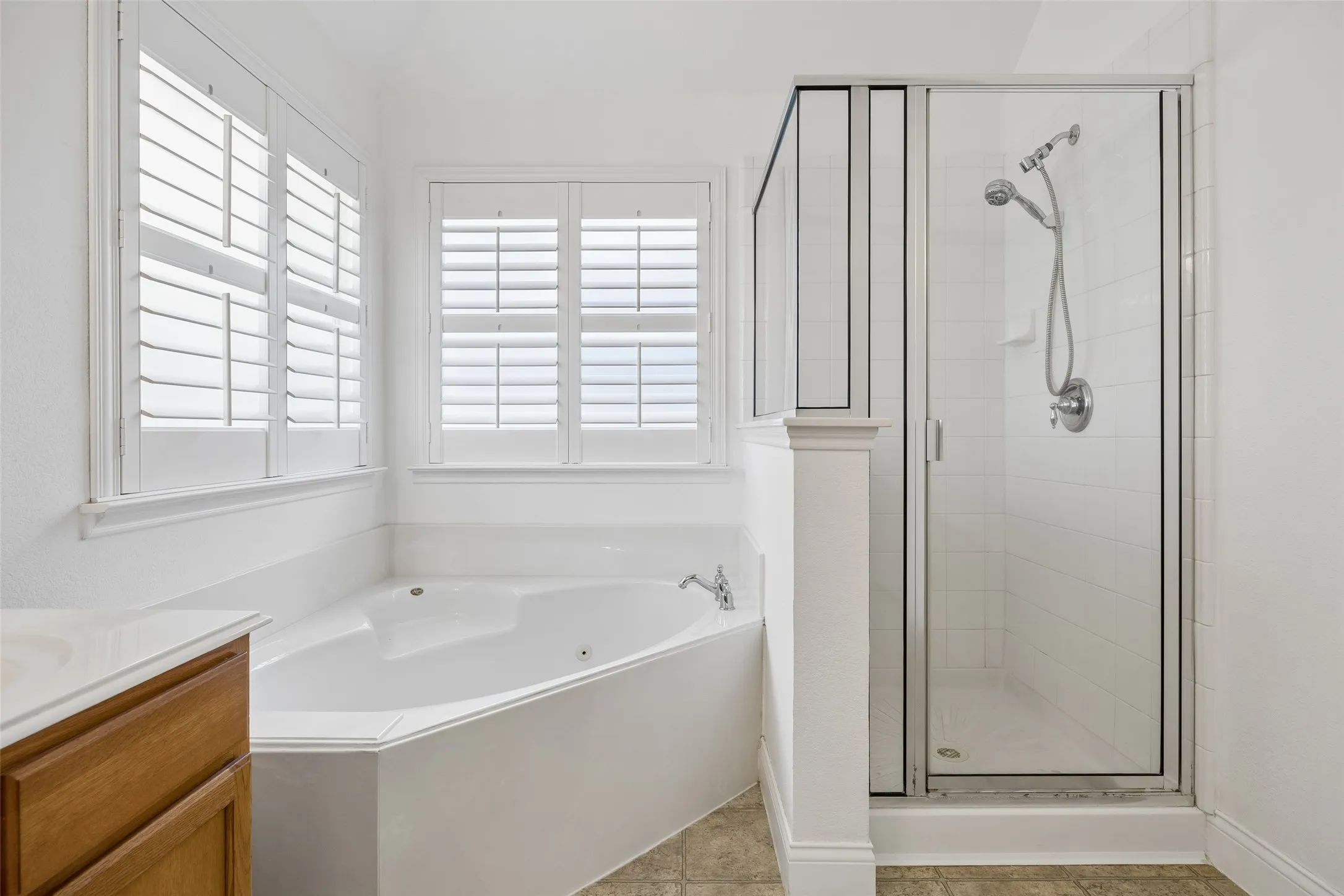 Relax and unwind with a jetted soaking tub and separate shower.