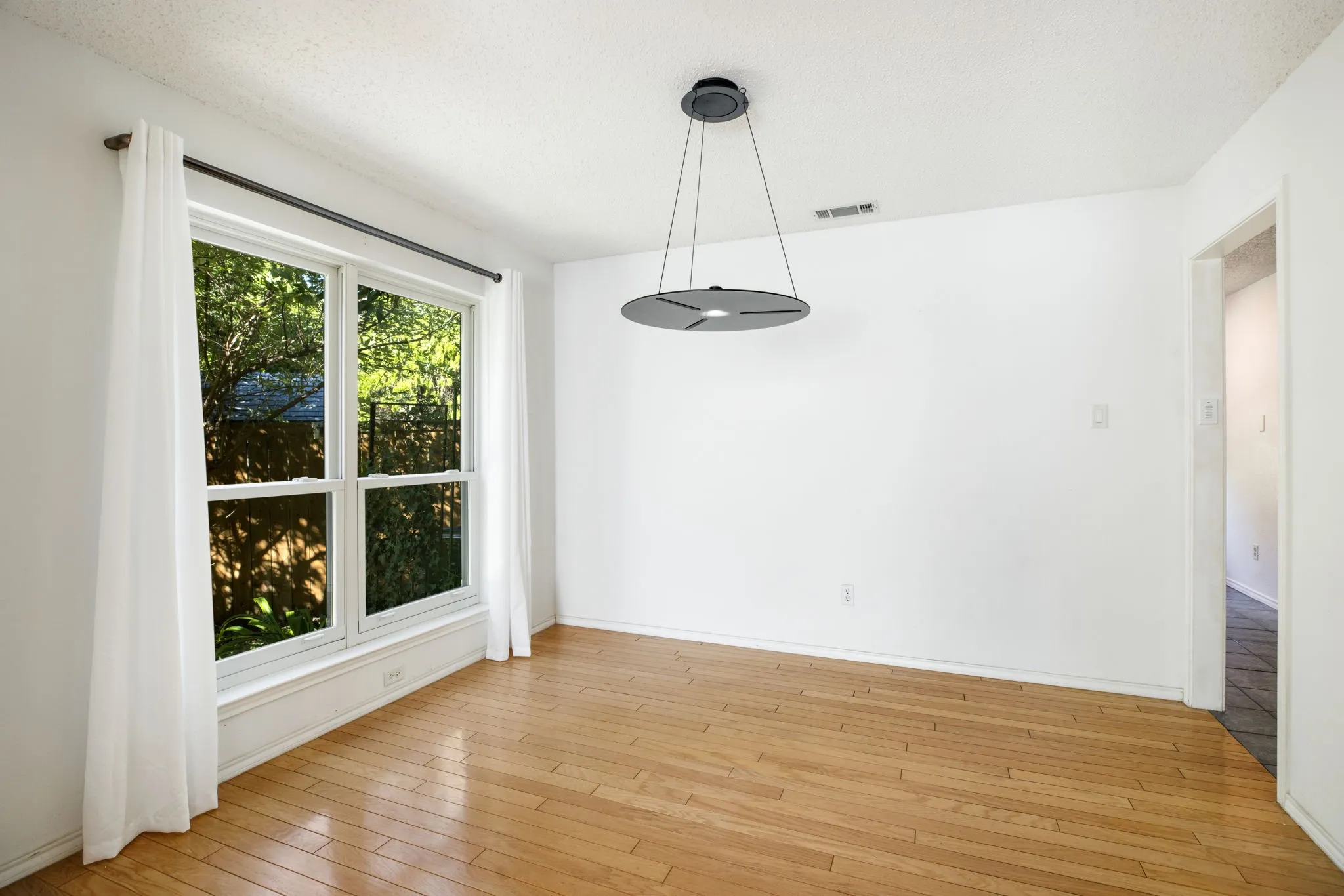Hardwood-style flooring throughout