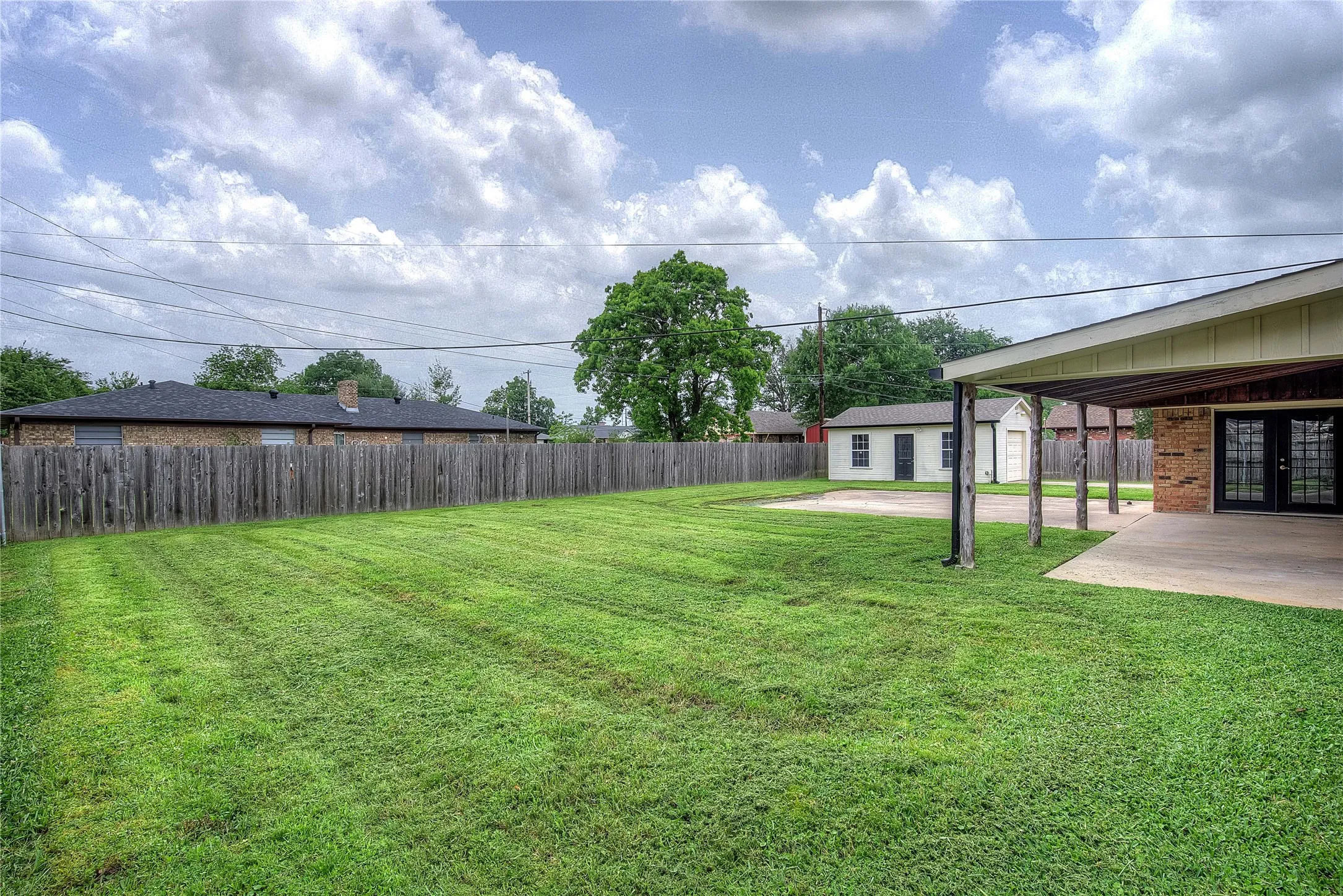 Generous back yard, fully privacy fenced.