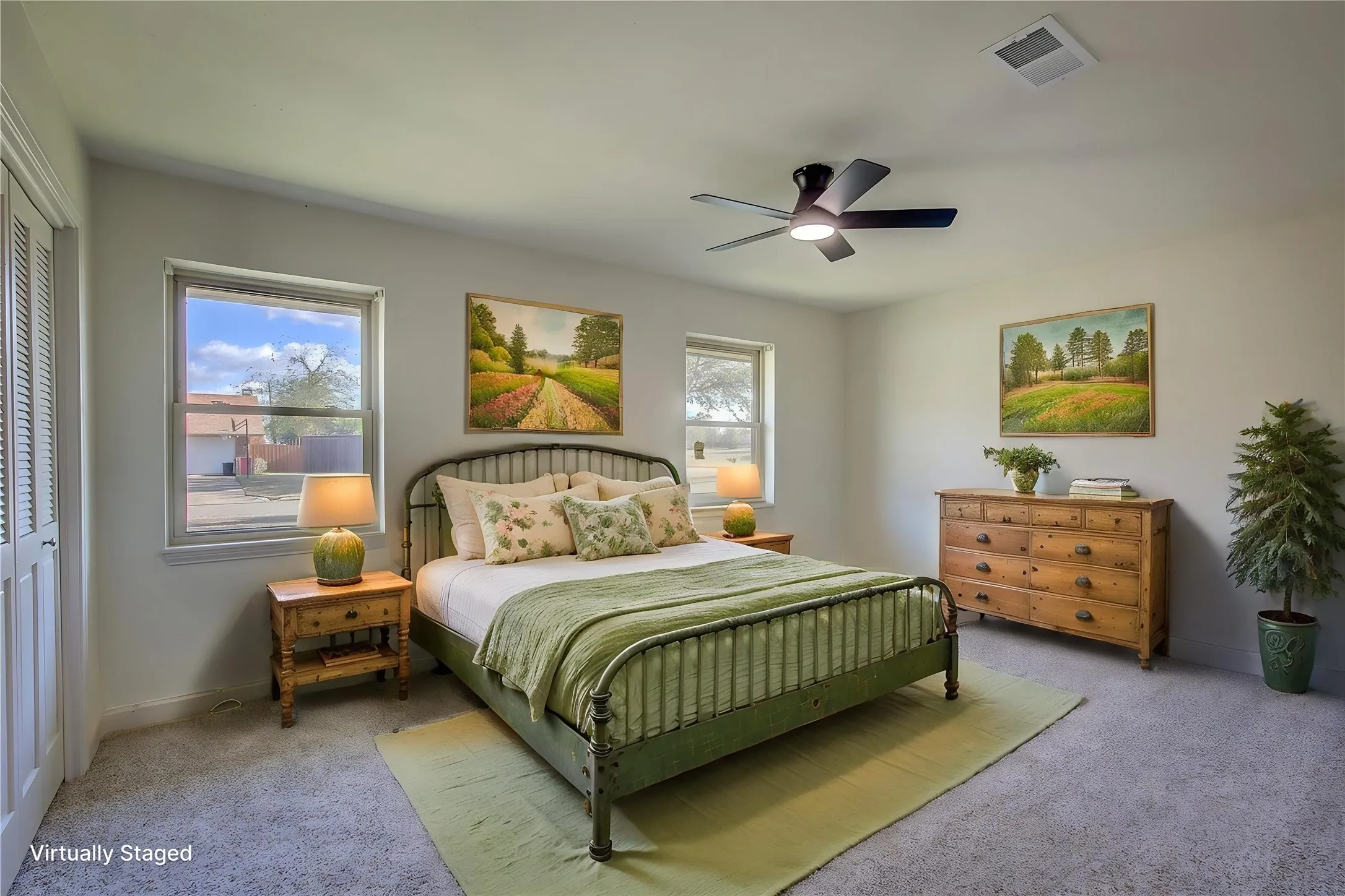 Bedroom 2 has double windows, ceiling fan.