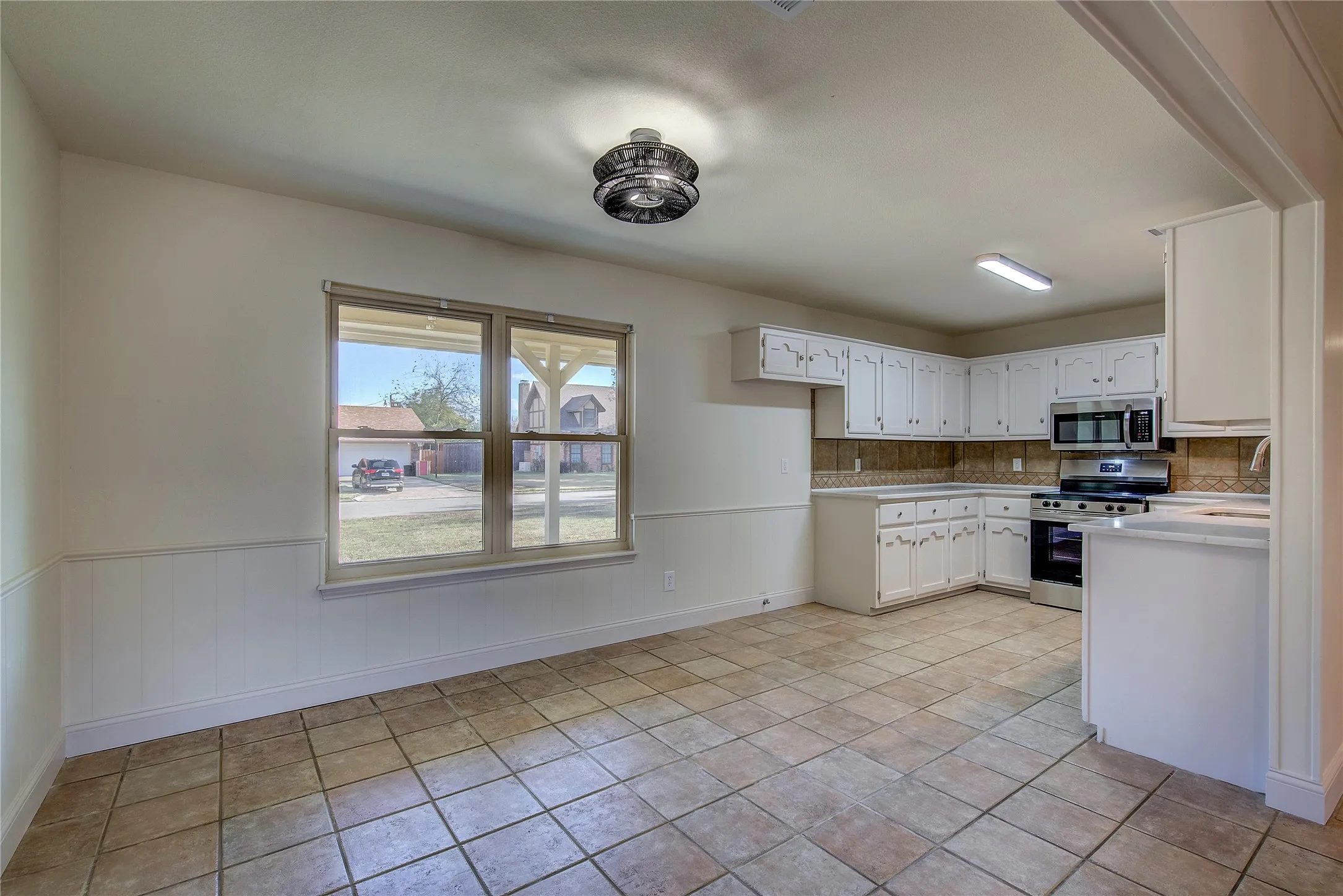 Generous dining area open to kitchen.