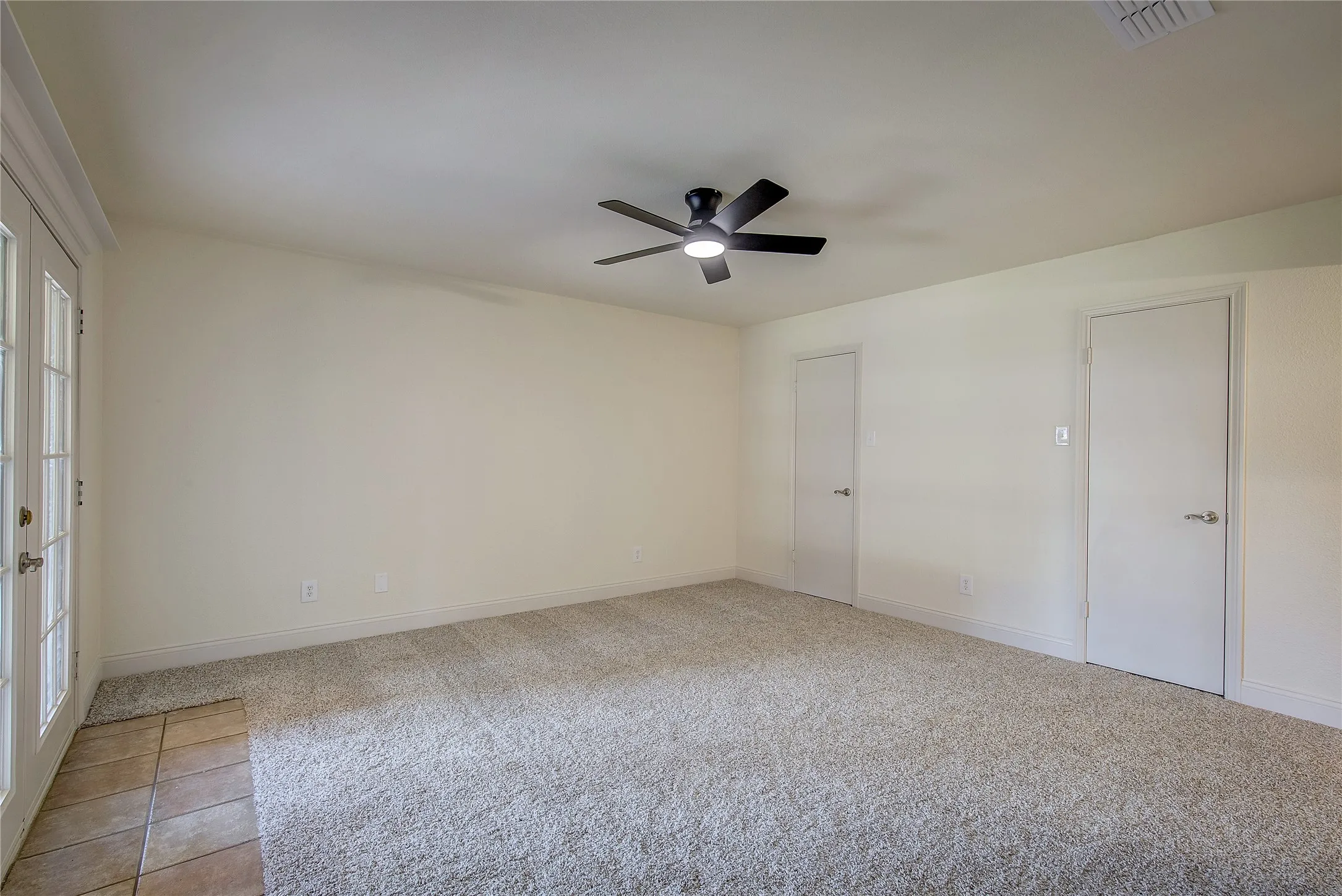 Primary bedroom large enough for seating area