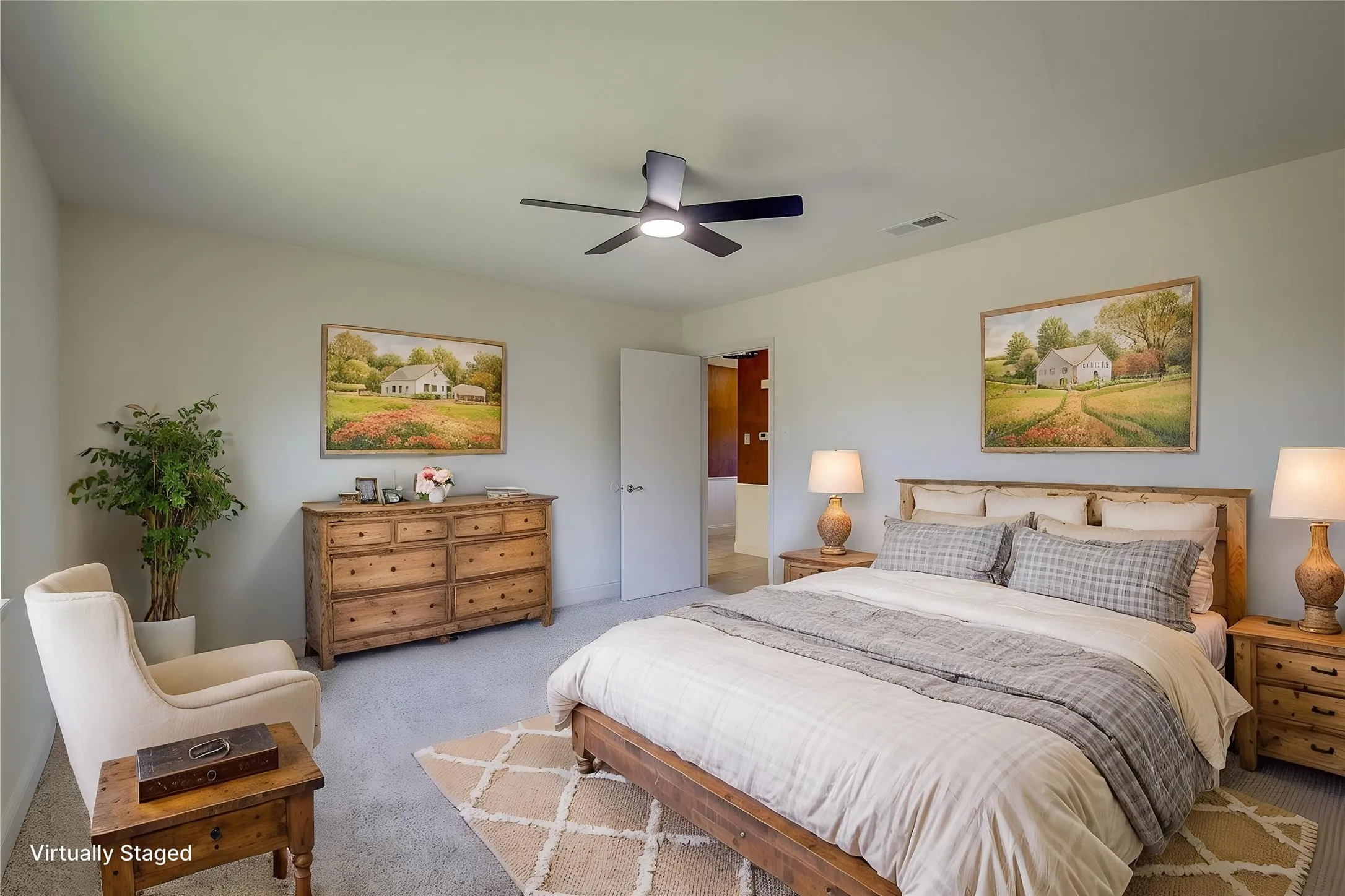 Bedroom 3 has new carpet, paint and ceiling fan.