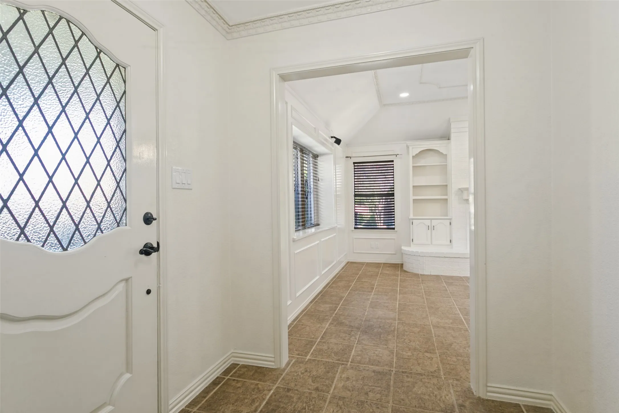 White entry door with leaded glass insert