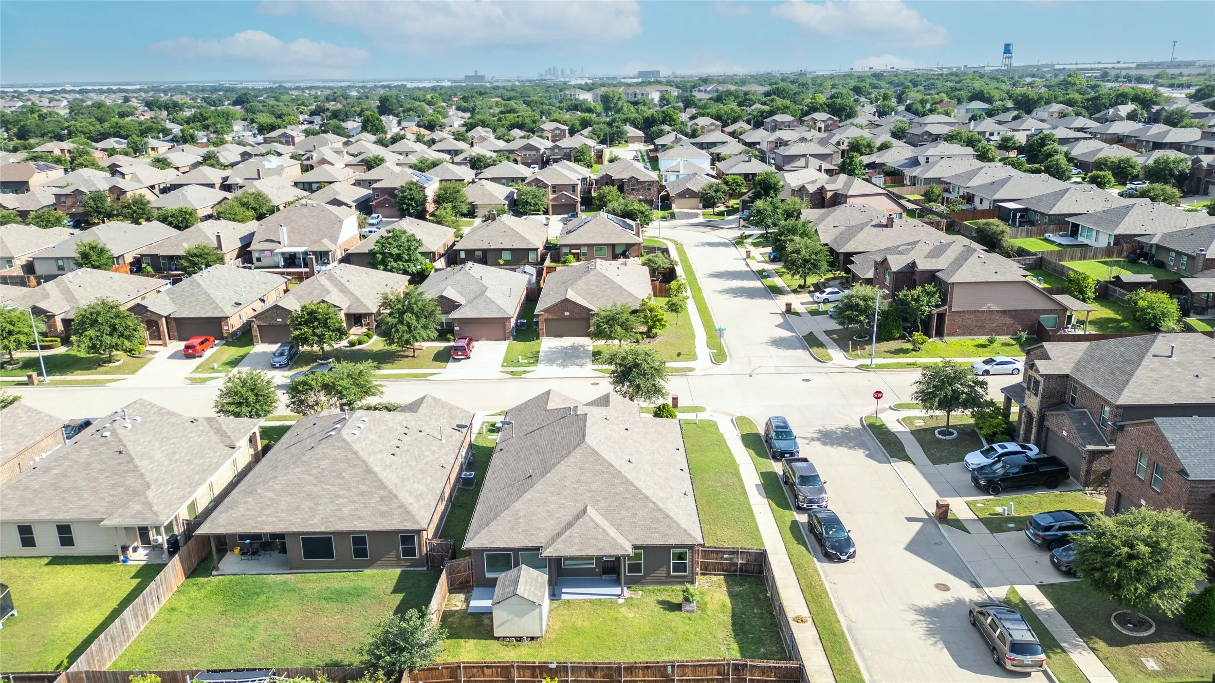 Established residential neighborhood featuring mature trees and a consistent architectural style