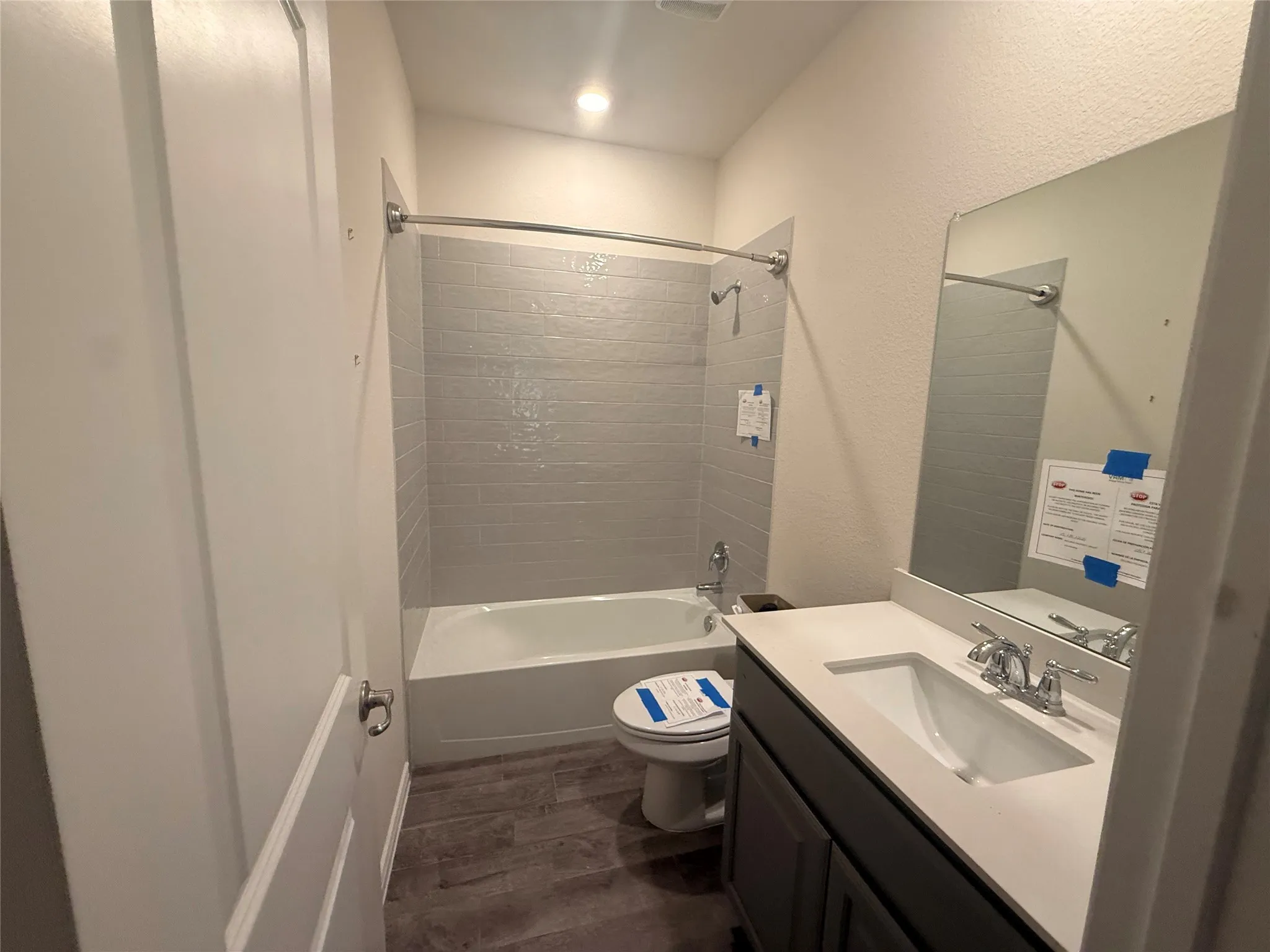 Tub and shower combination with subway tile surround