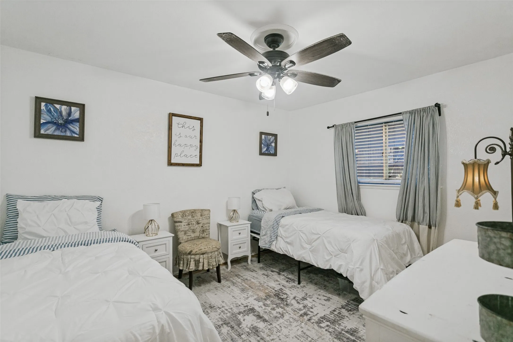 Recessed lighting with a ceiling fan, window with blinds, and wood-finish flooring