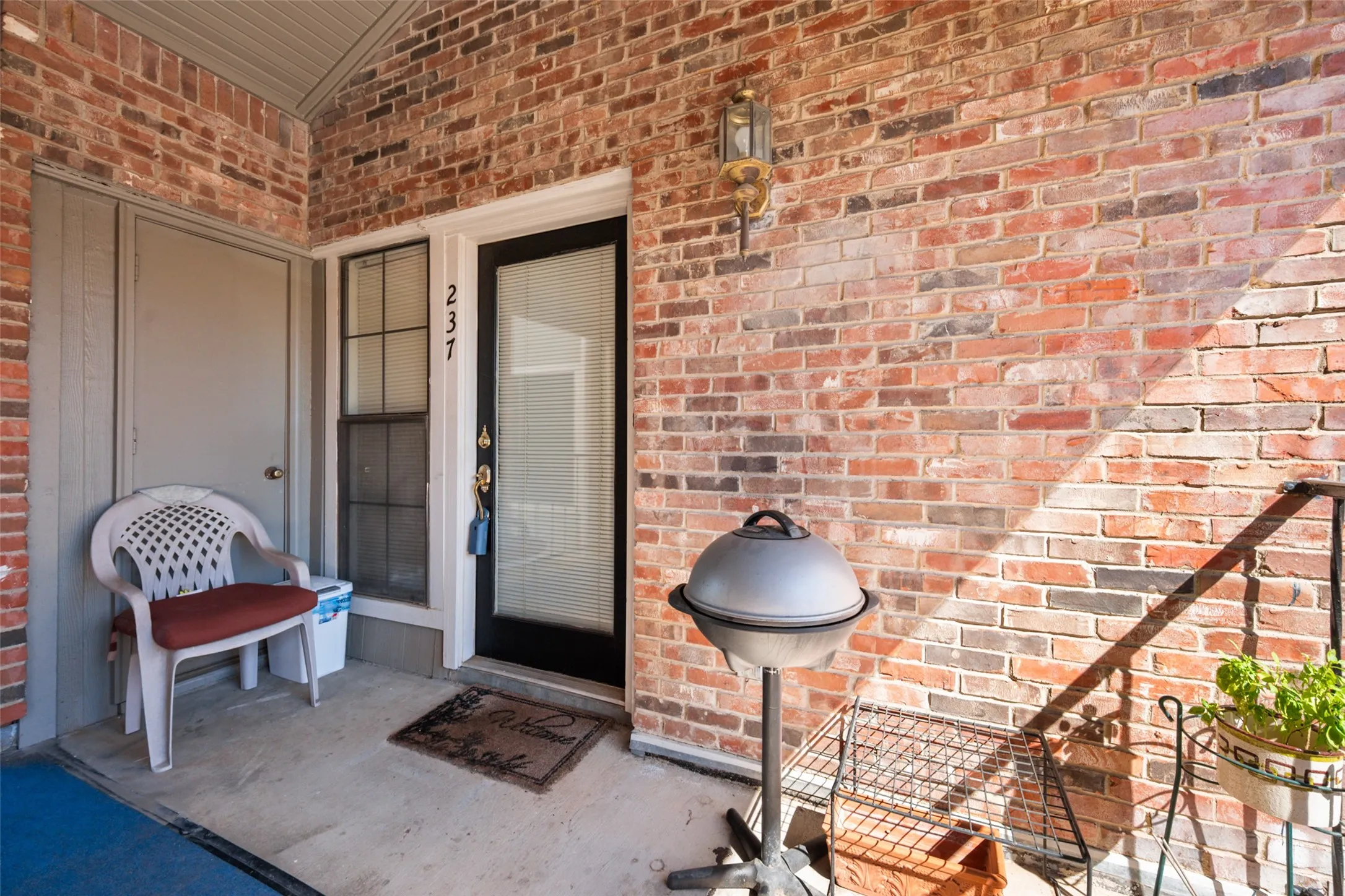 Entrance features a nice size storage and large covered entry area