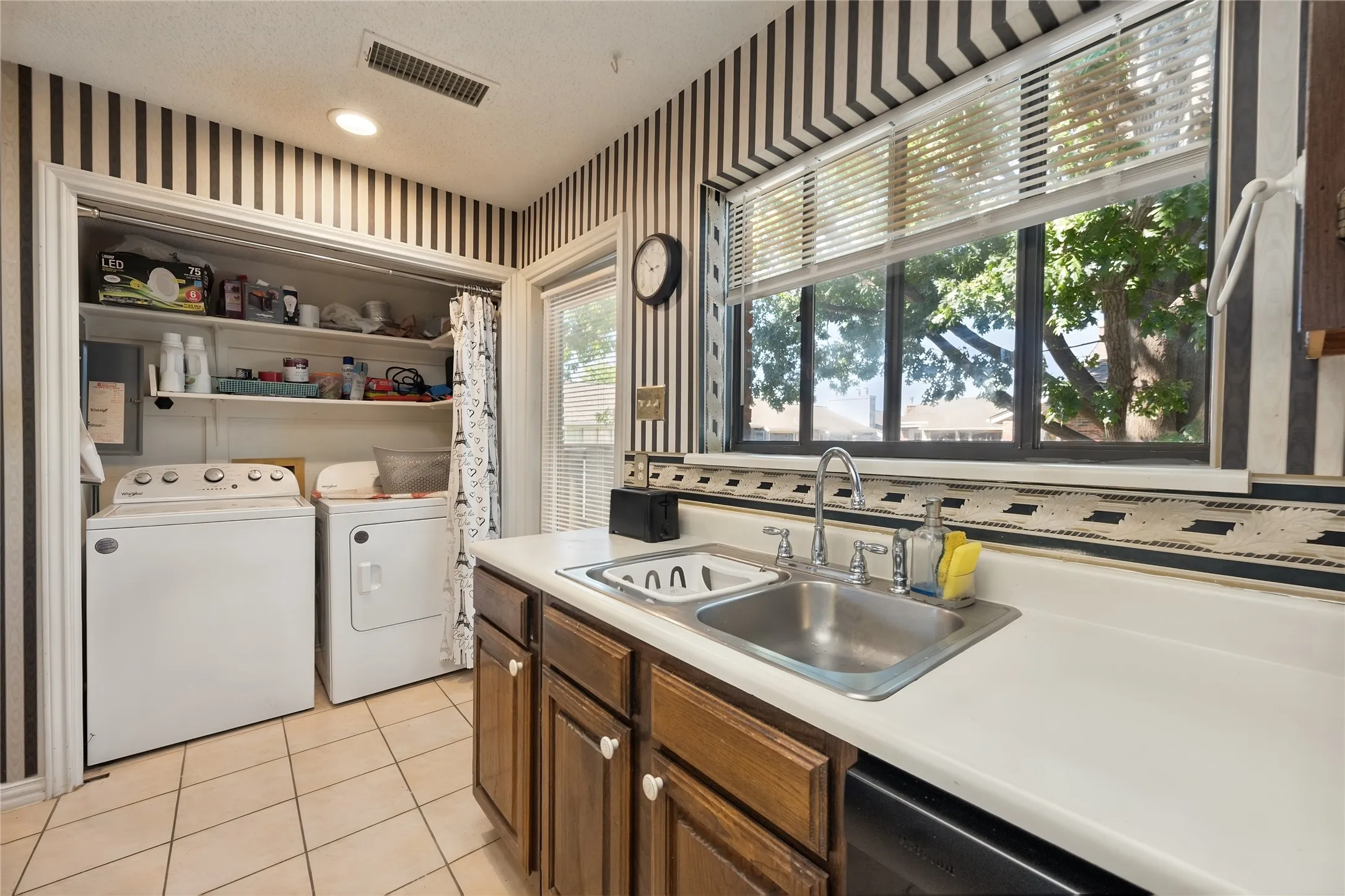 Laundry with new washer and dryer that stay!