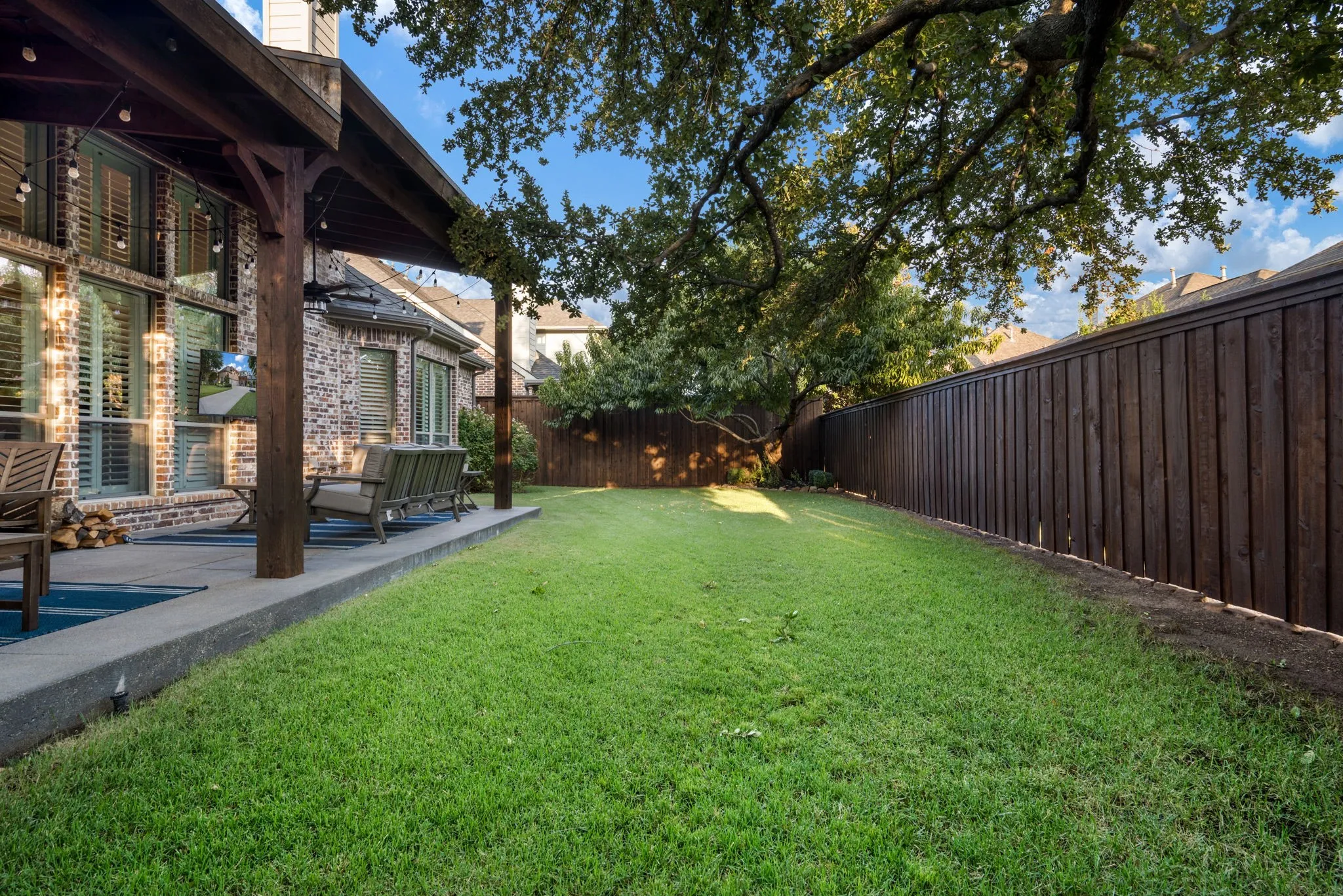 well maintained back yard with a wide lot