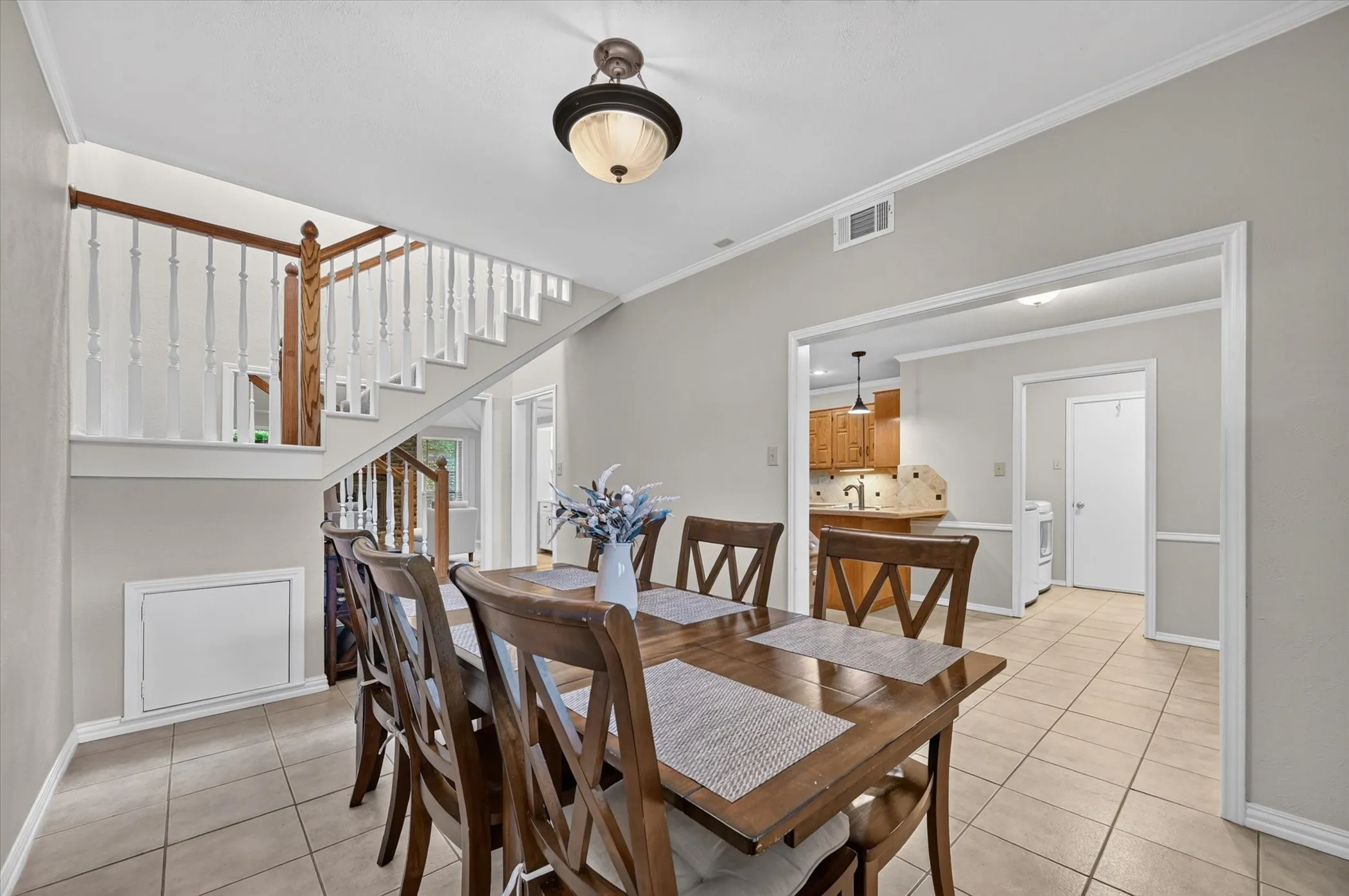 The dining area is large enough for a table with seating for 8 & looks into the living room with the fireplace & the breakfast area.