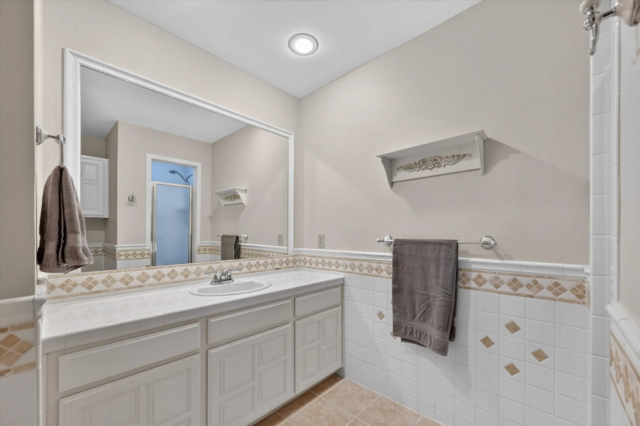 The upstairs hall bathroom has a shower.