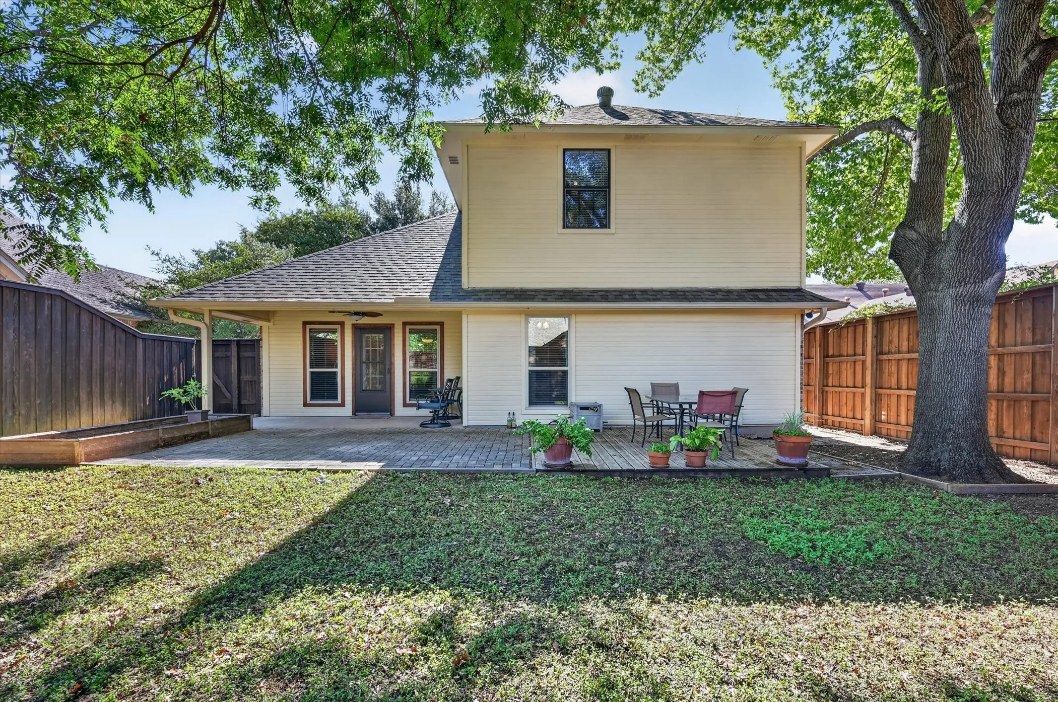 The backyard is large enough for a pool if you wanted to add one.
