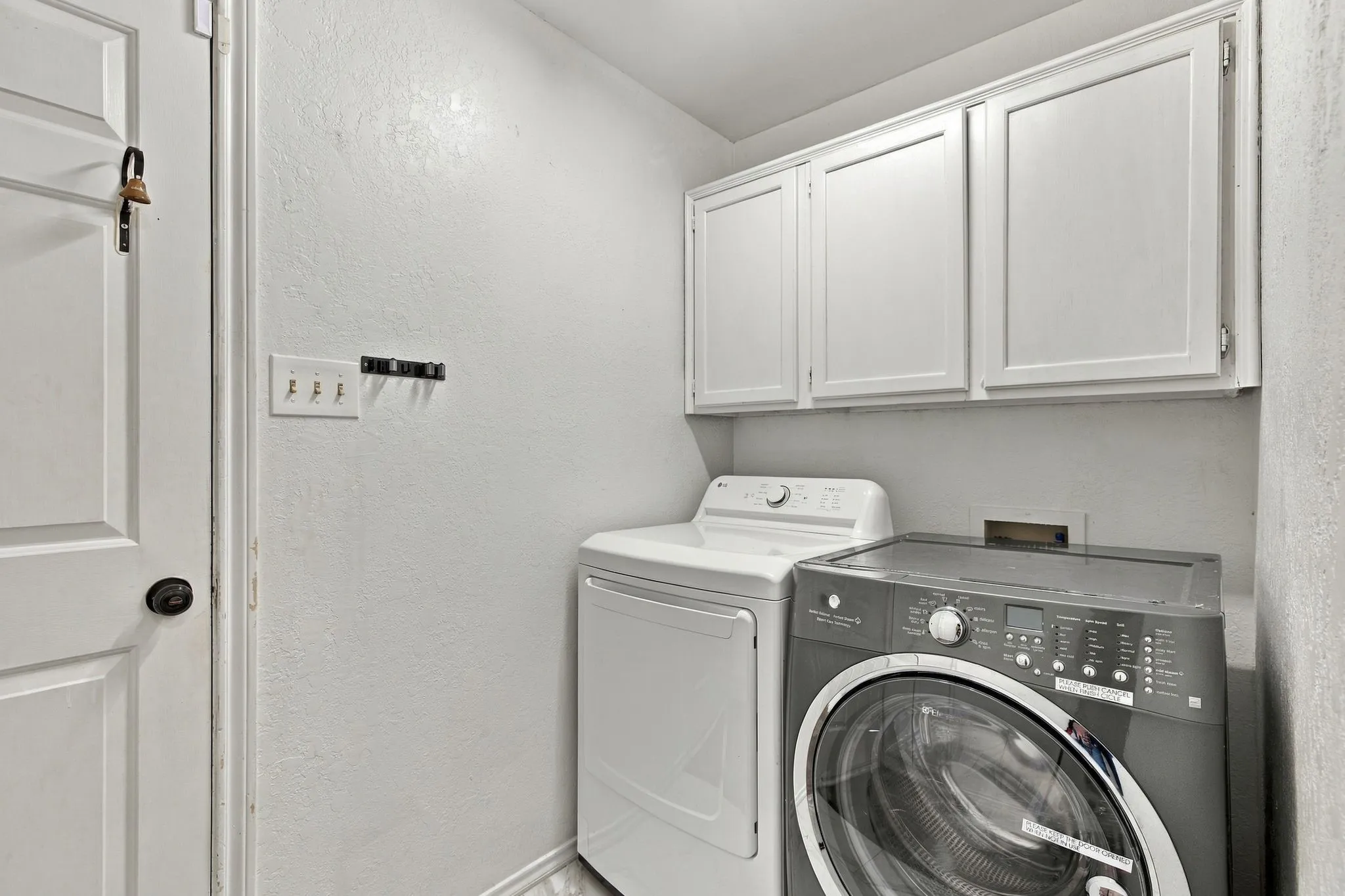 Wall-mounted cabinetry providing storage