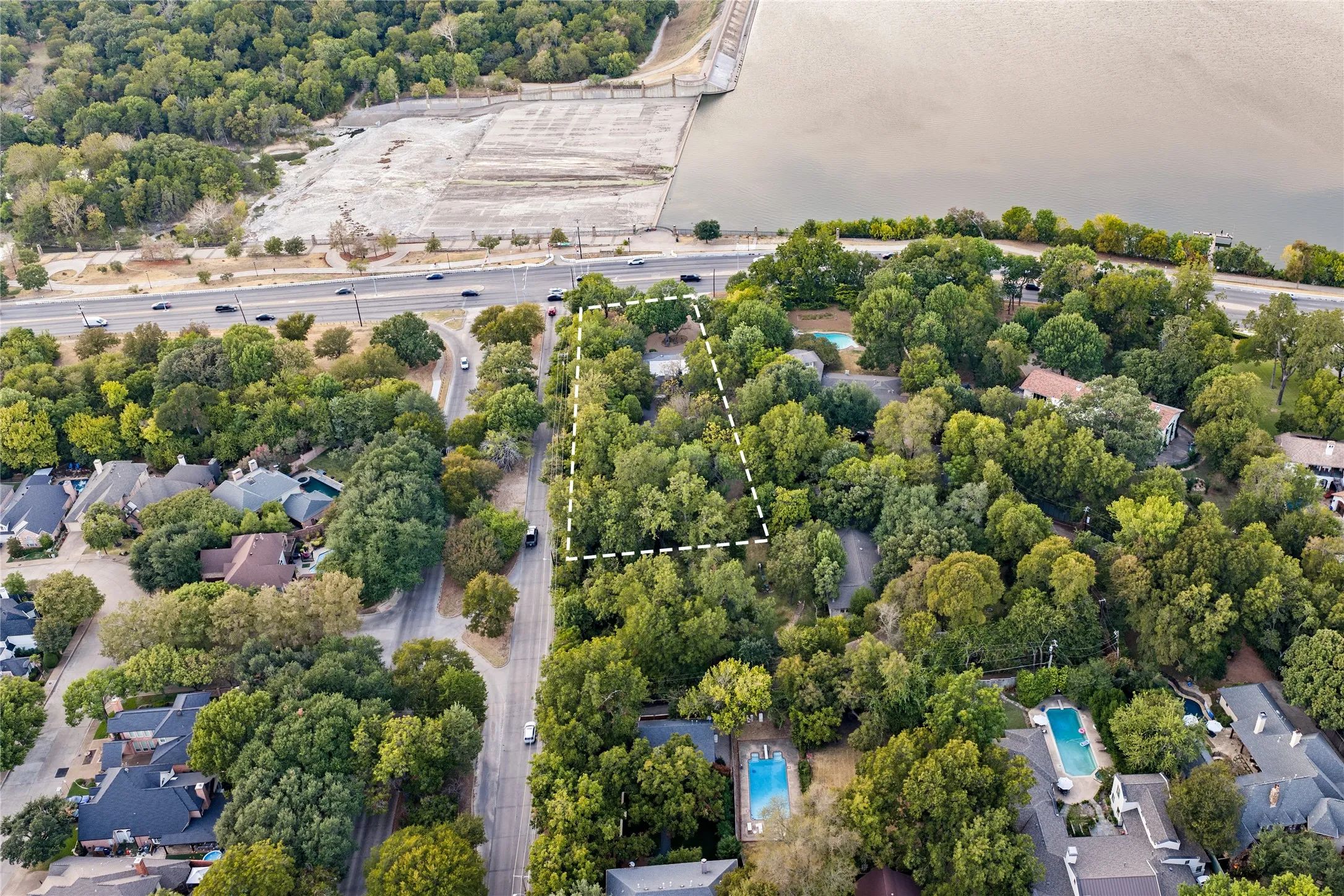 Wooded lot with mature trees, offering a natural setting
