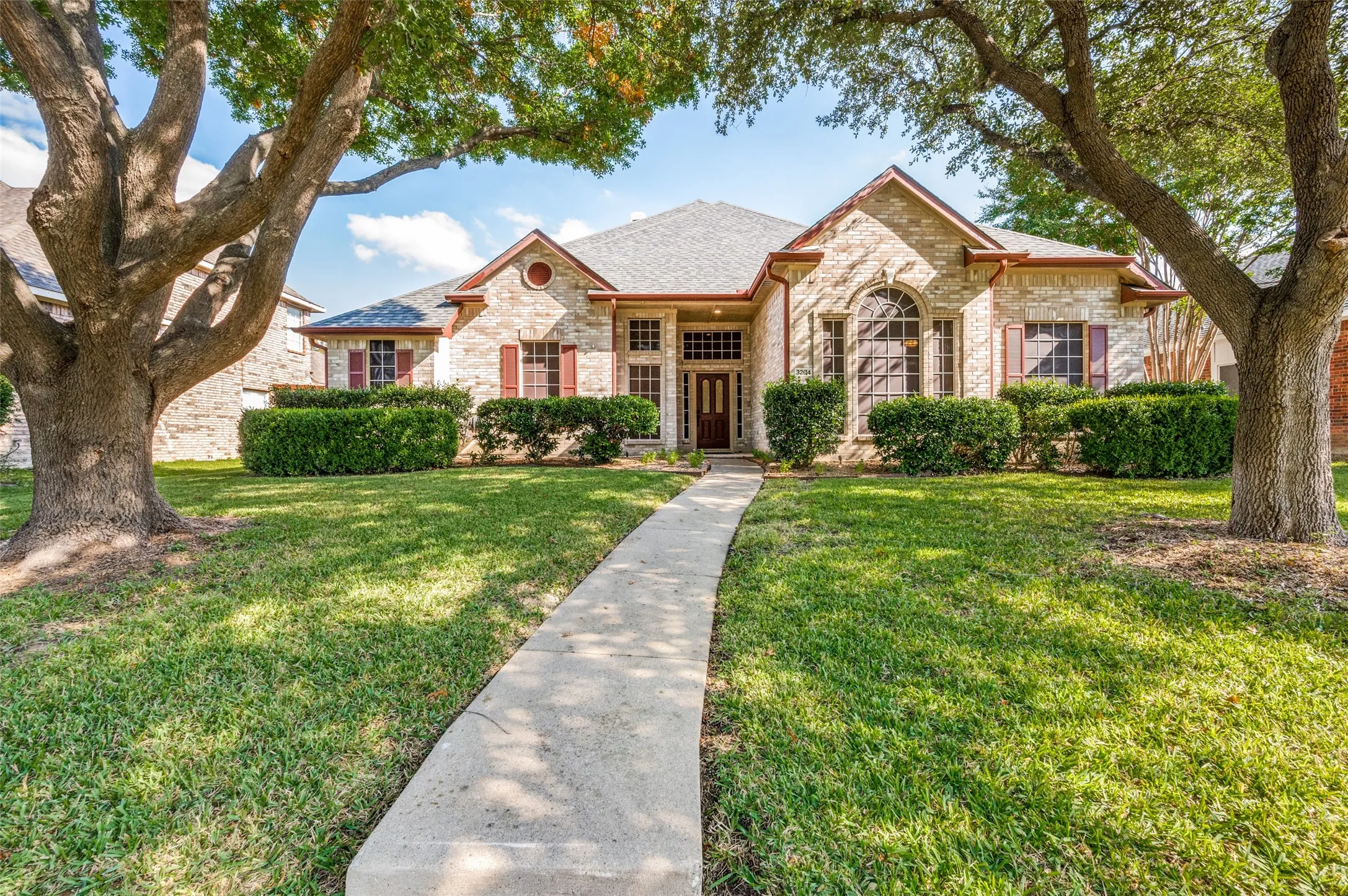 Straightforward front elevation view.  Sprinkler system and tons of extras come with this lovely home.