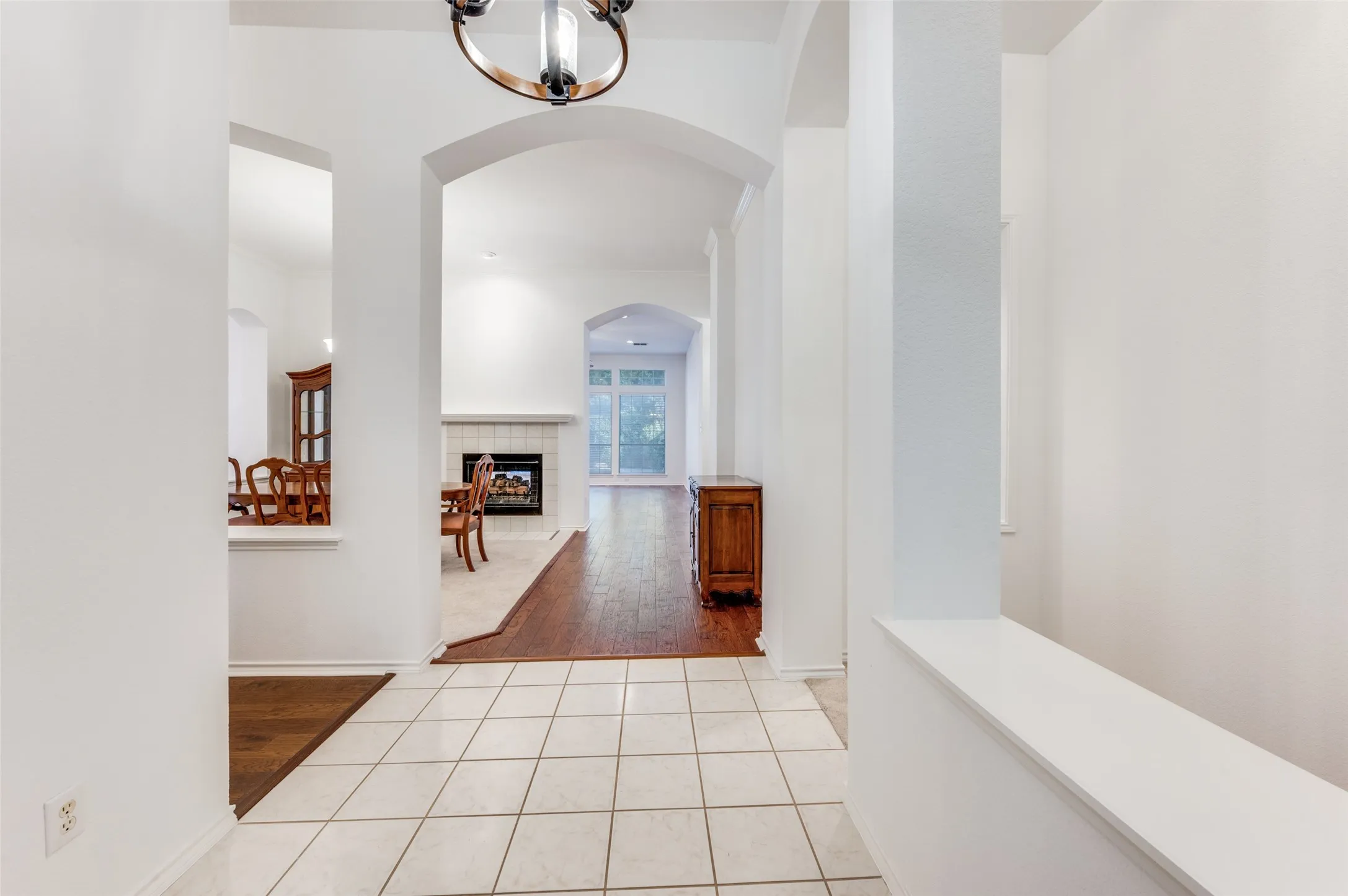 Entryway into this lovely home.  Open floorplan with lots of space.  Office to the left down halllway.