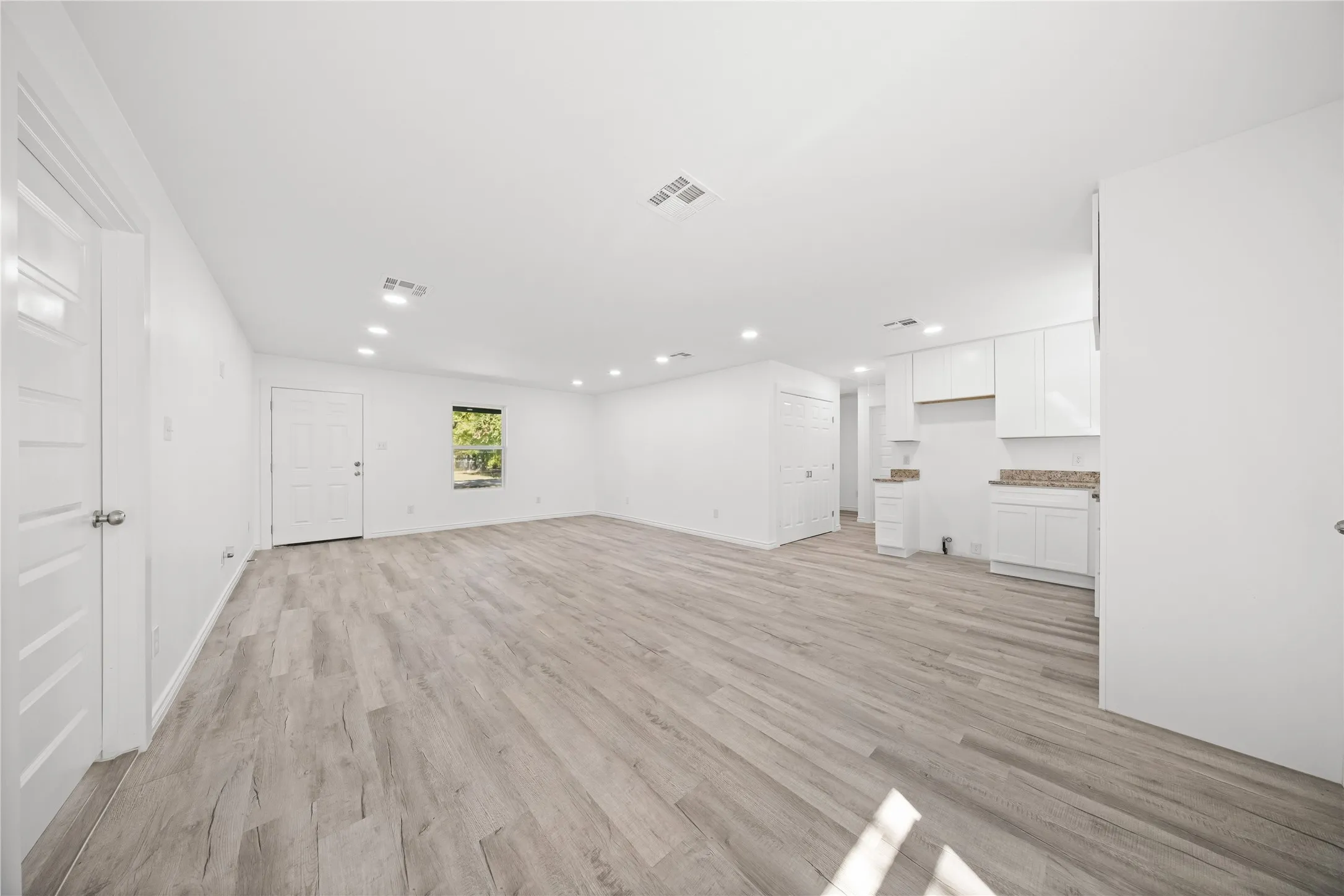 open concept, living space, dining and kitchen