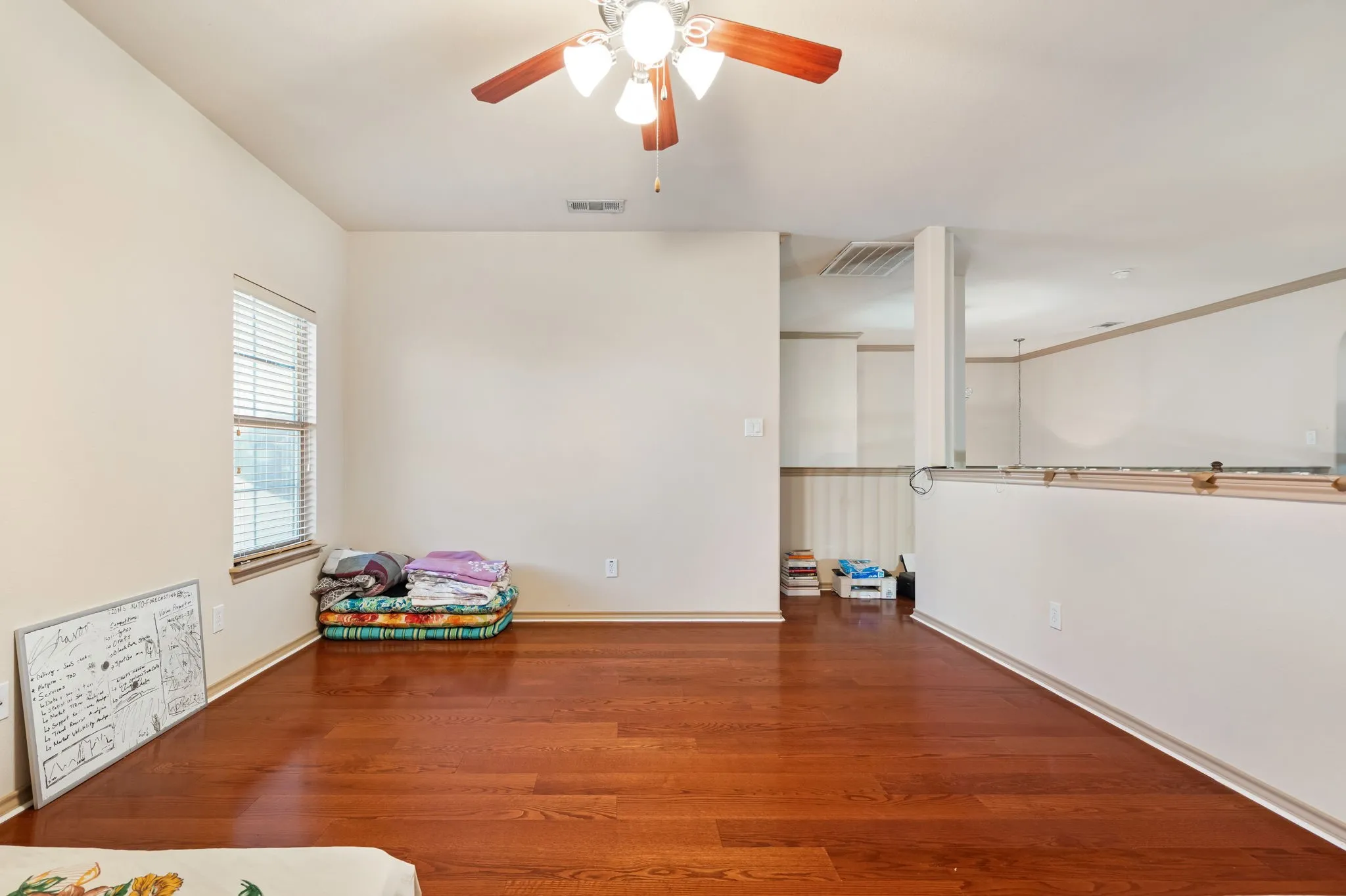 Game Room upstairs with open to below into the Living Room