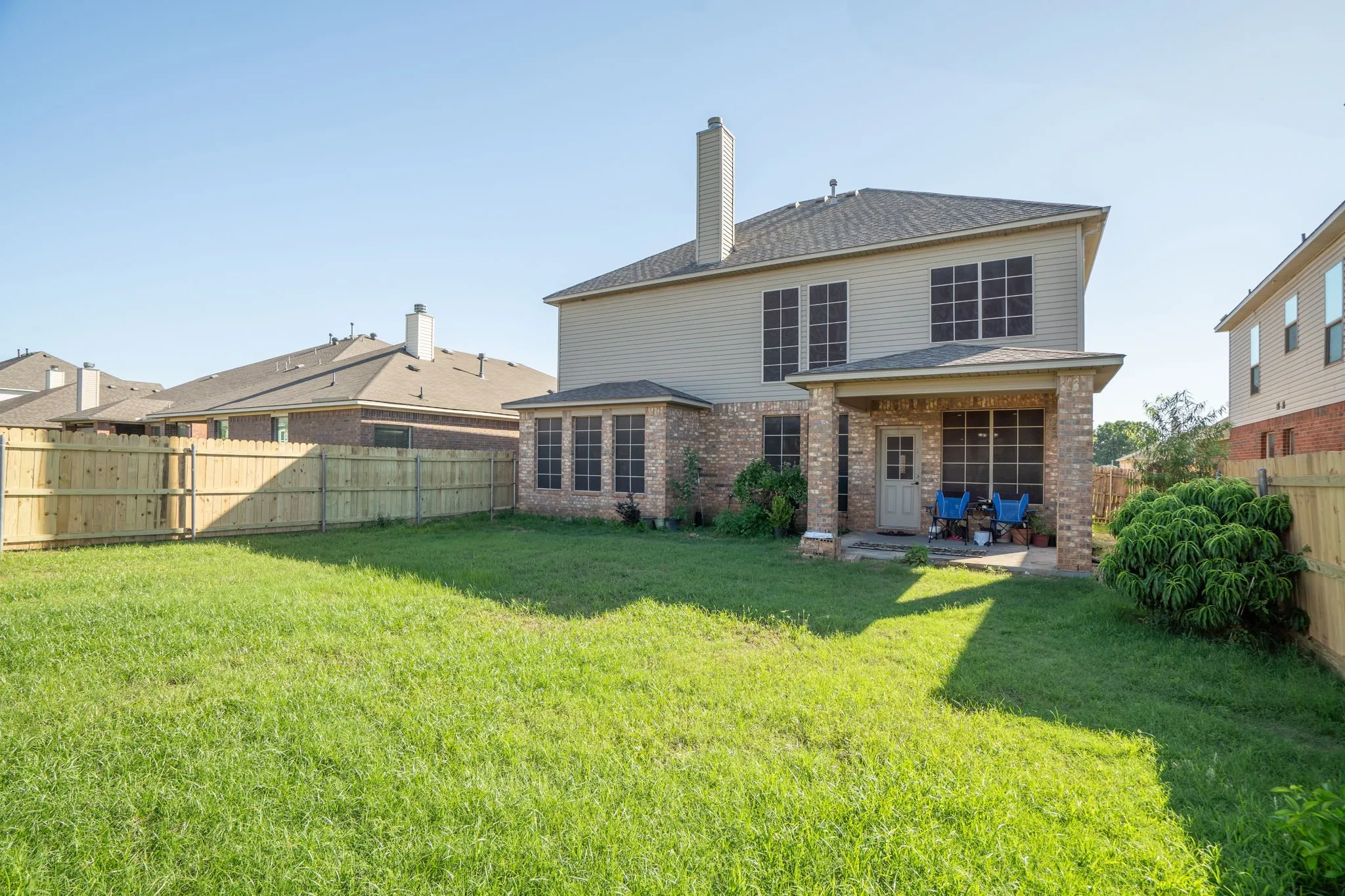 Covered back patio and good size yard space