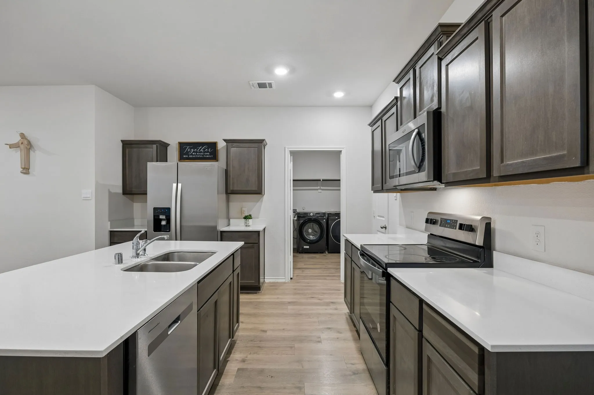Kitchen featuring stainless steel appliances and recessed lighting
