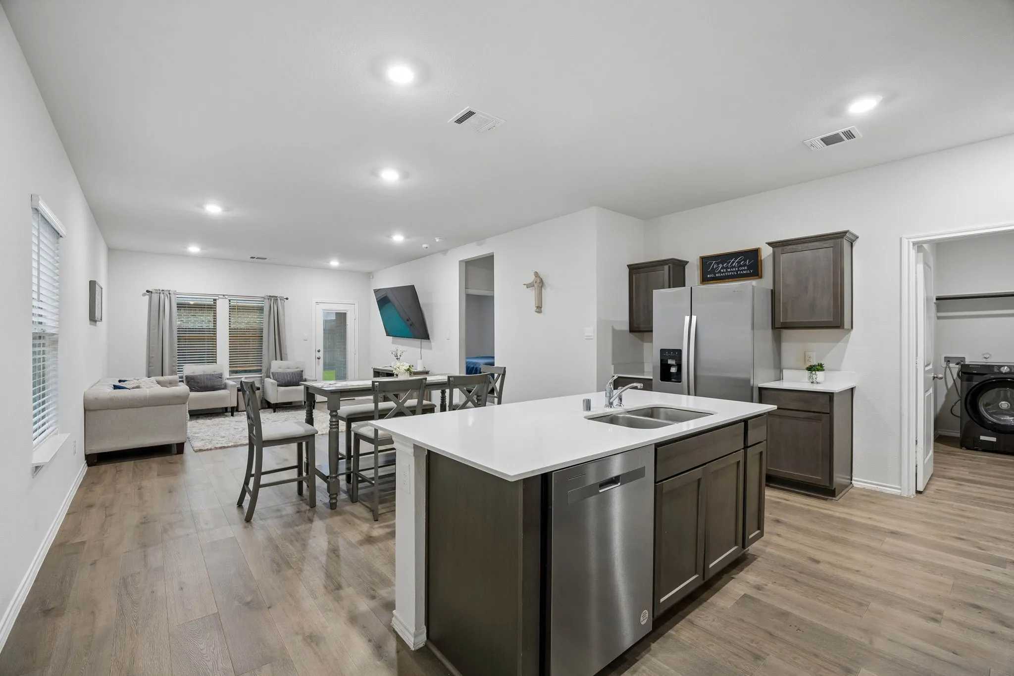 Here you can see the open concept layout with the kitchen, dining room and living.