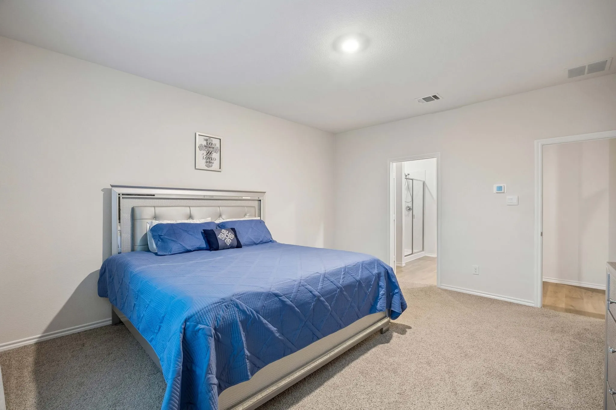 Primary suite featuring recessed lighting.