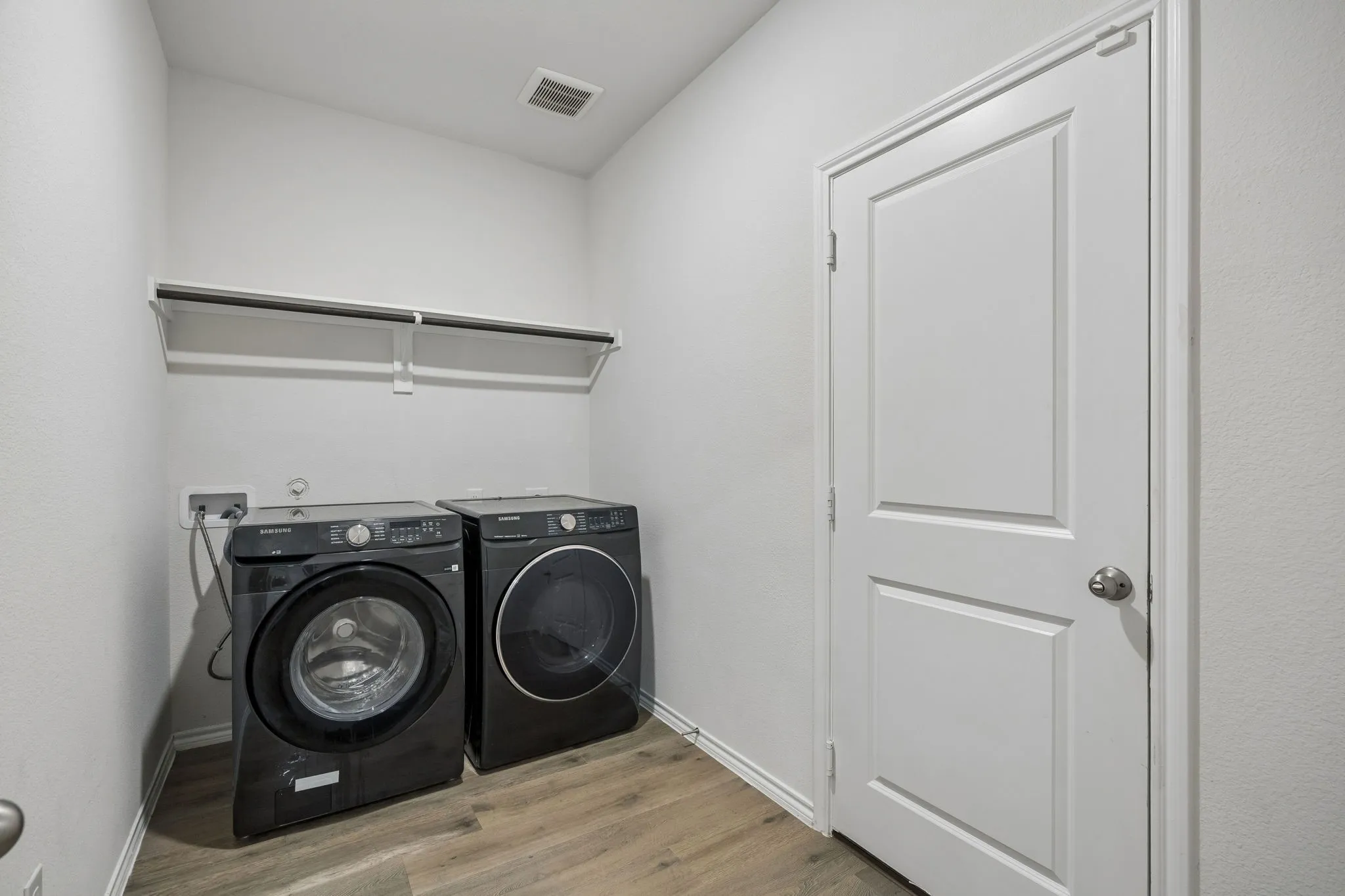 Laundry room with open storage
