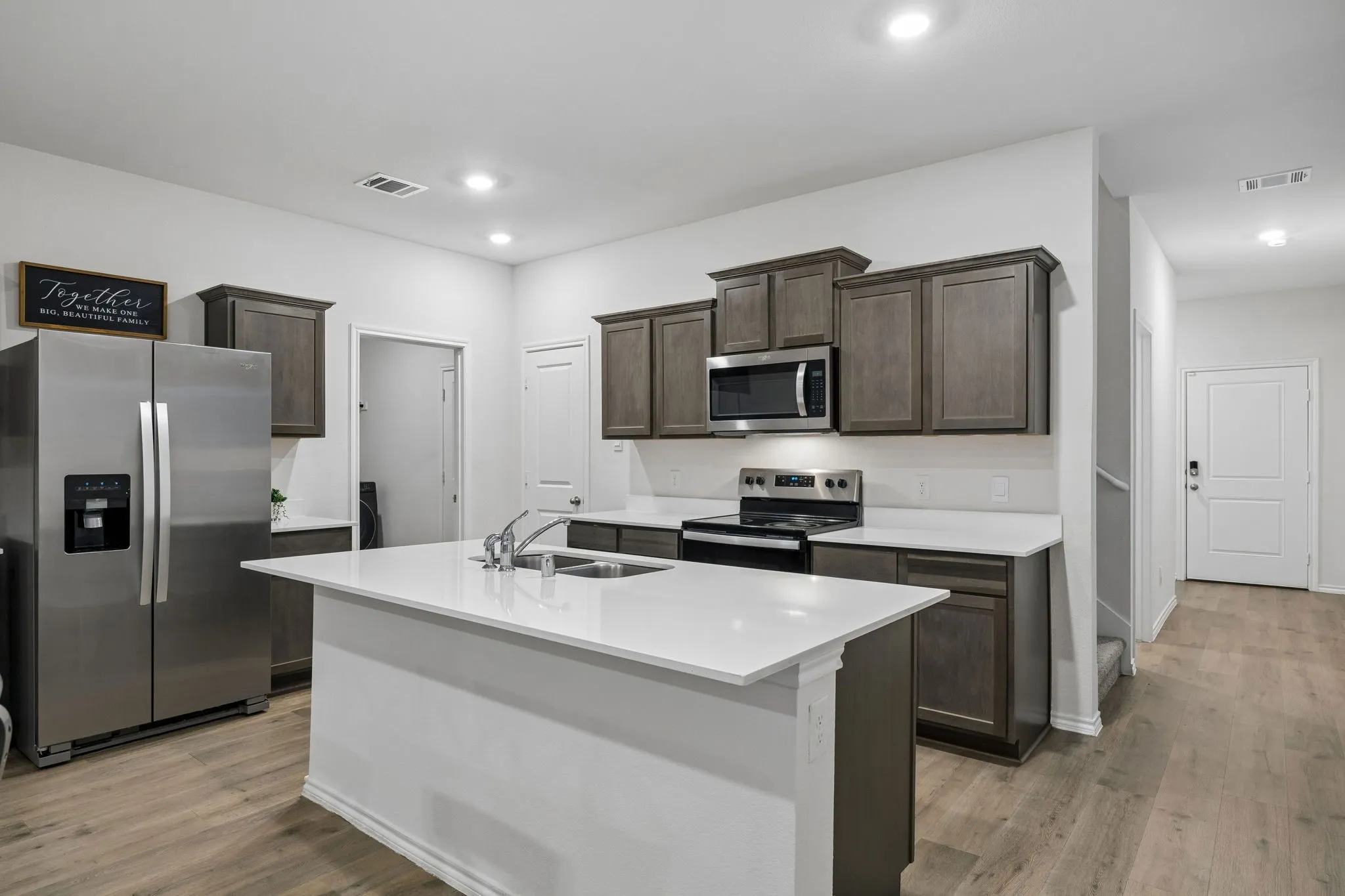 Here you can see the laundry room on the left and the pantry on the right.