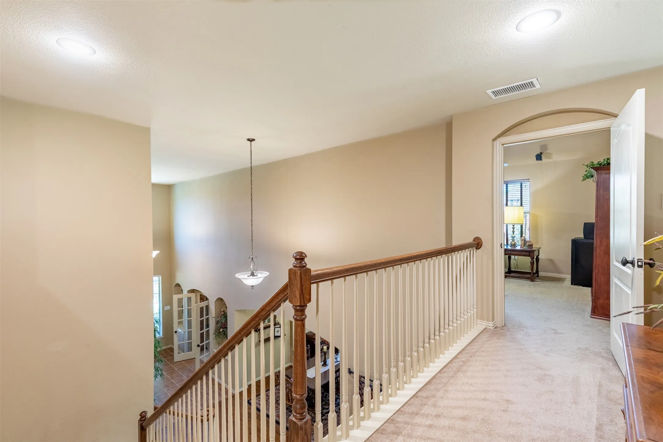 Balcony area overlooking first level.