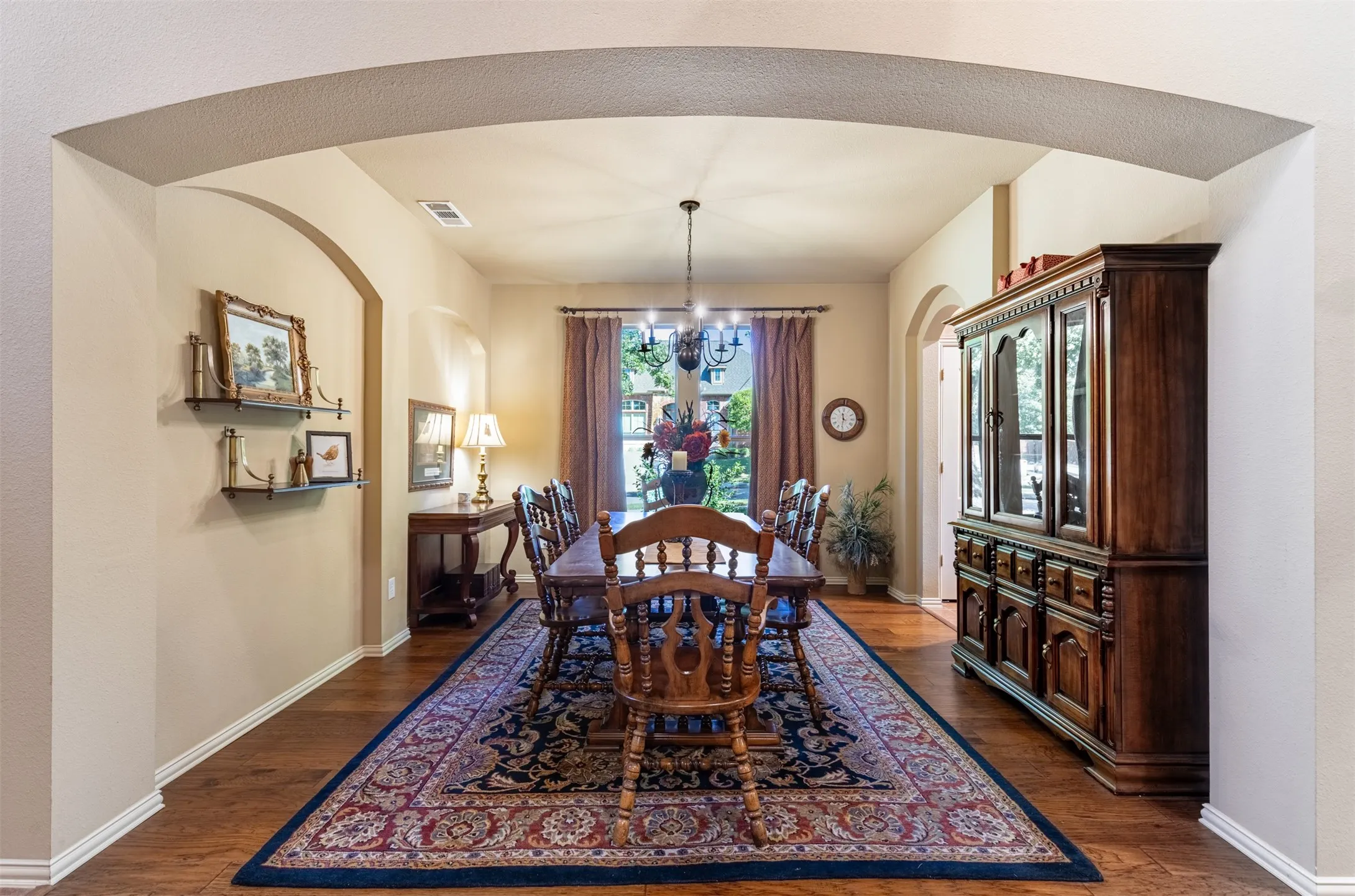 Generous formal dining room with architectural detailing.