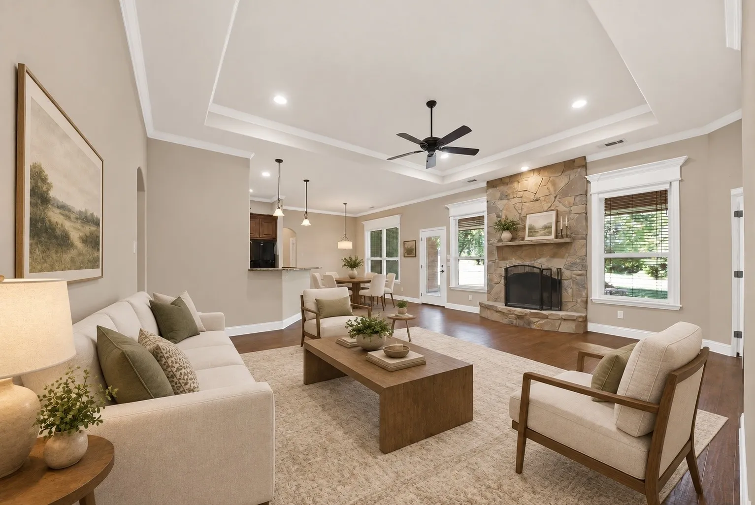 **Virtually staged living area with SW Agreeable Gray walls and white tray ceiling**