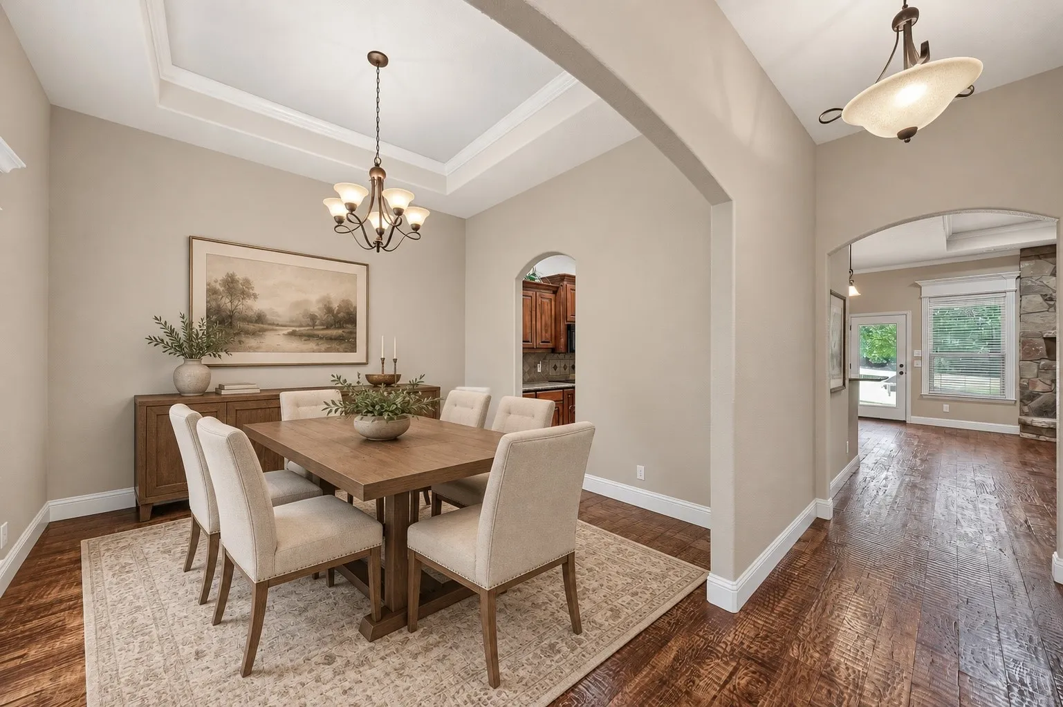 **Virtually staged dining room with SW- Agreeable Gray walls and white ceiling**