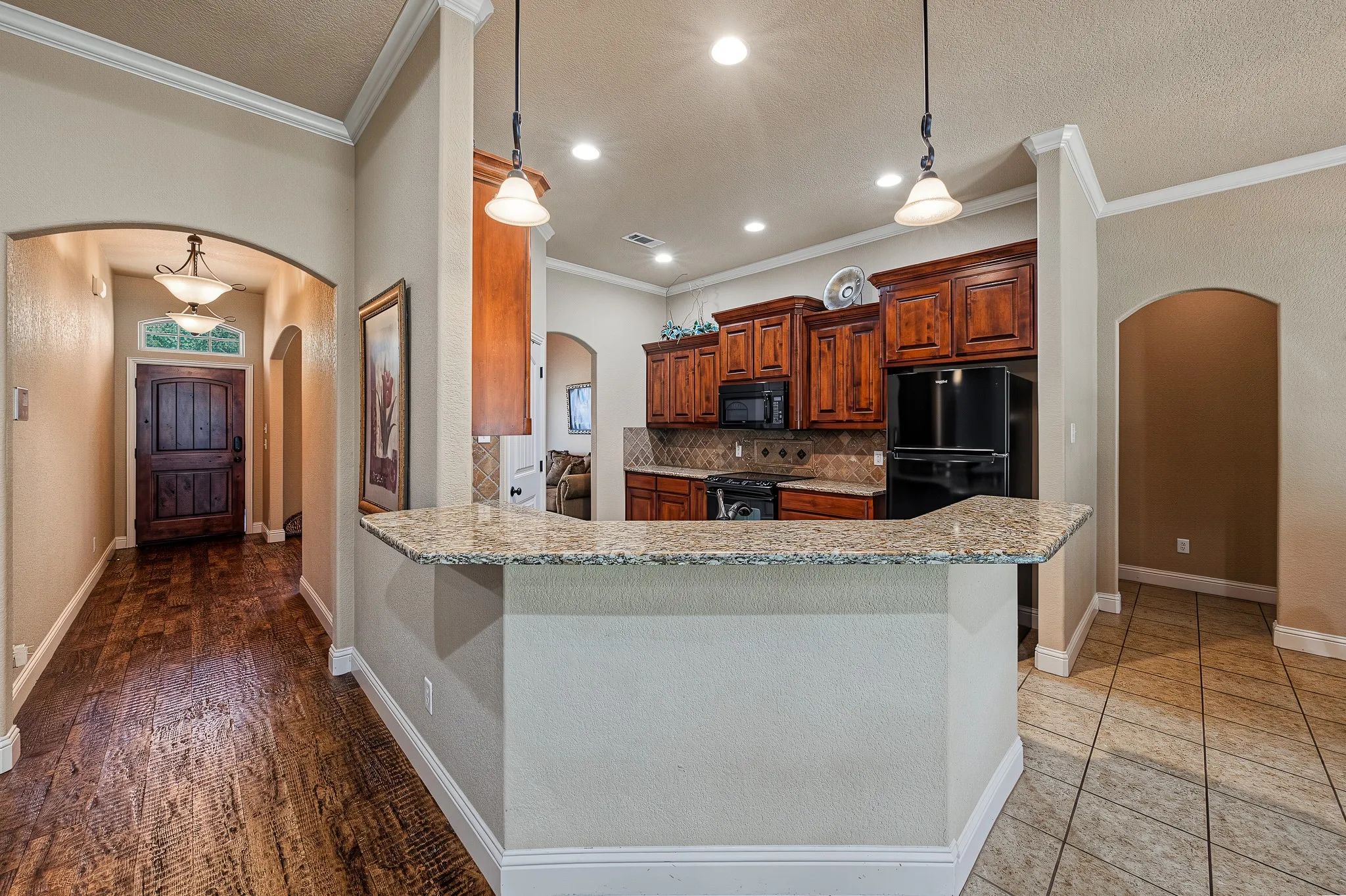 Kitchen overlooks living area