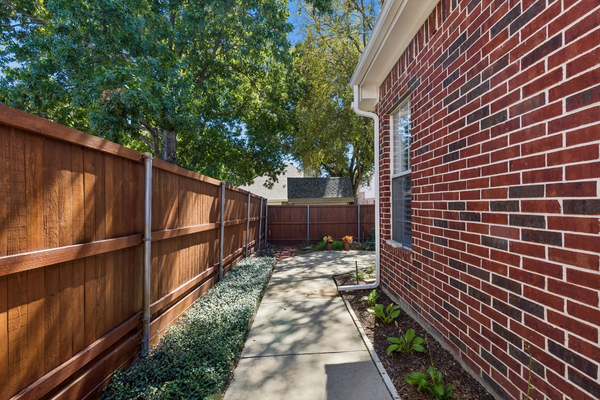 Walkway to low maintenance backyard