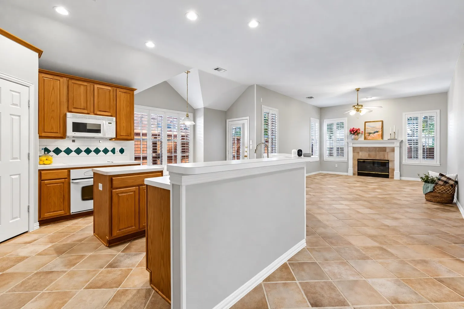Spacious kitchen overlooking living room