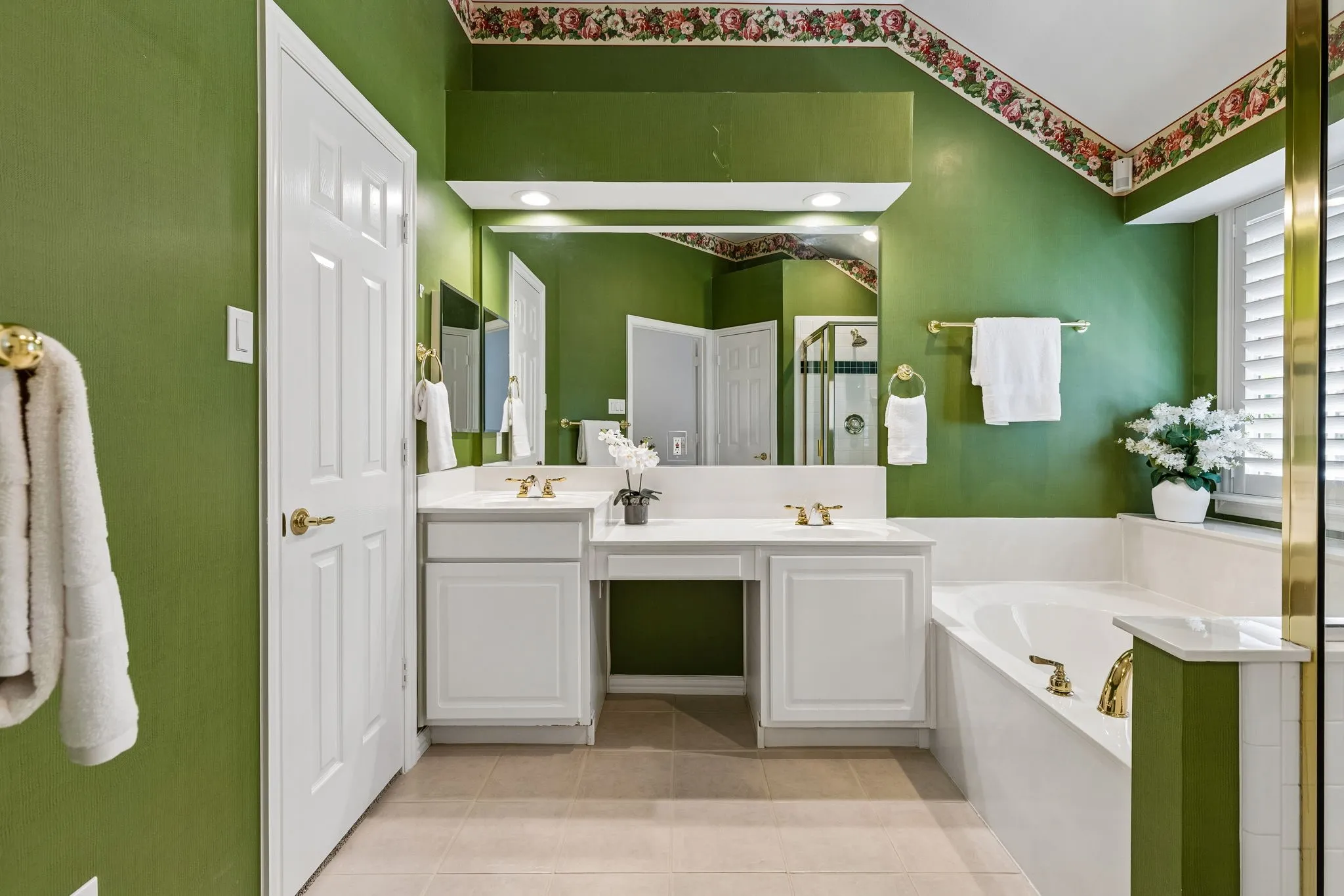Primary bathroom with soak tub and separate shower
