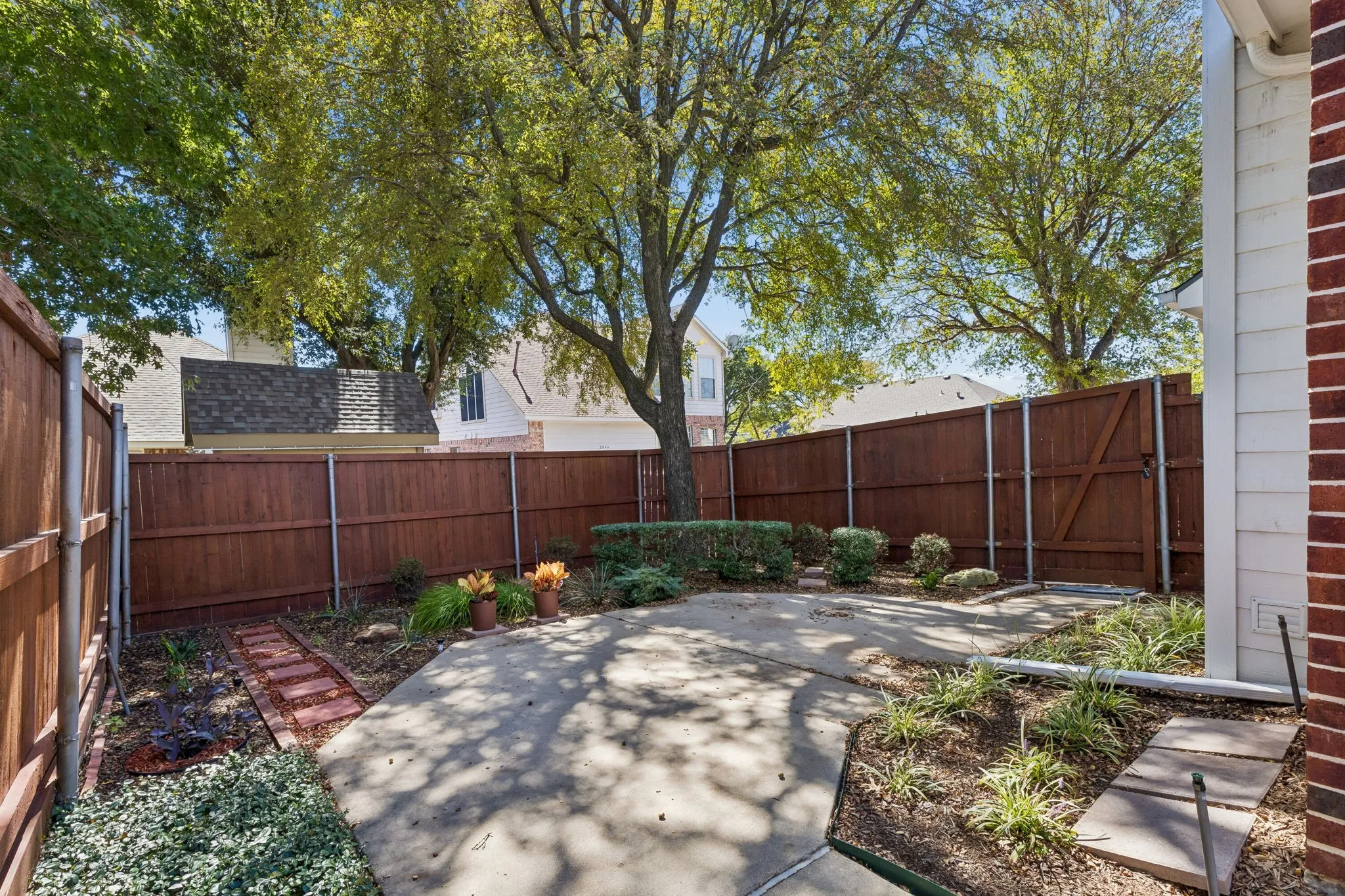 Cute backyard with driveway access