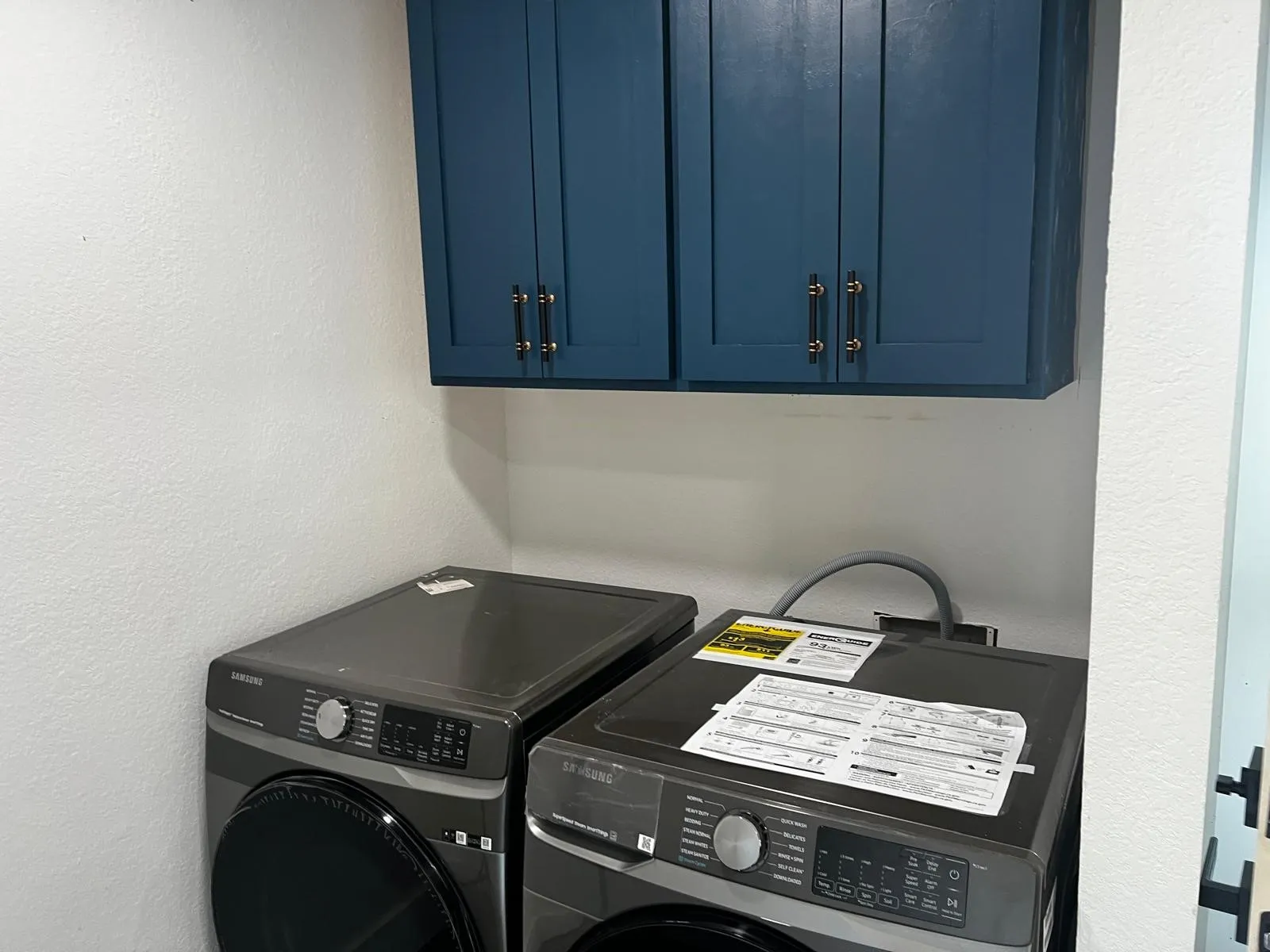 Built-in cabinetry with dark hardware