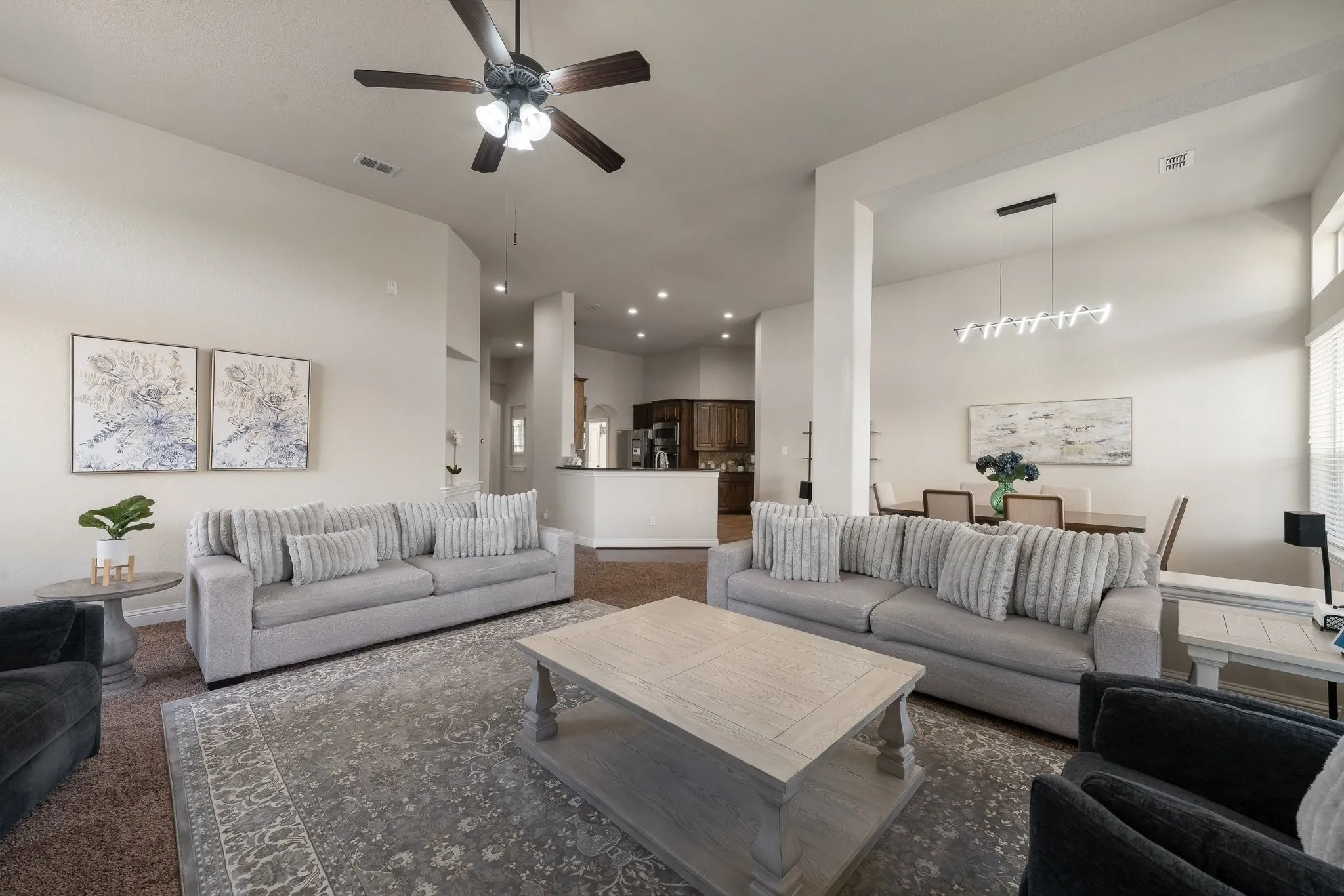 living room is open to the dining room and kitchen, great flow for entertainment