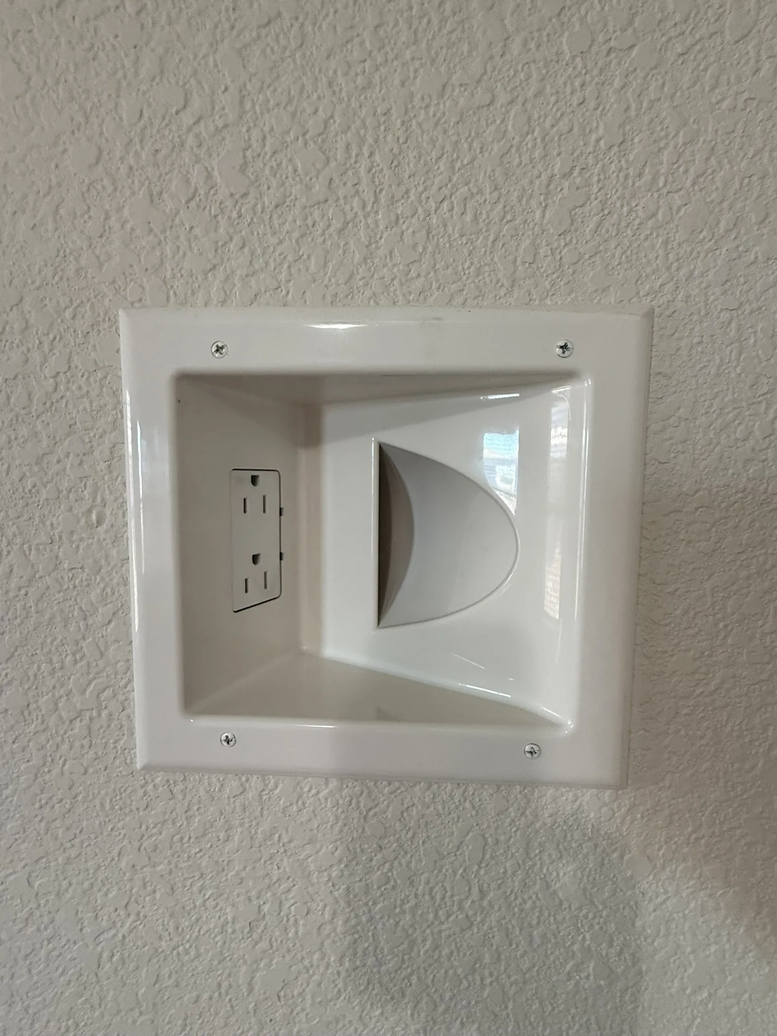 Flat Screen TV in-wall plug and cord storage