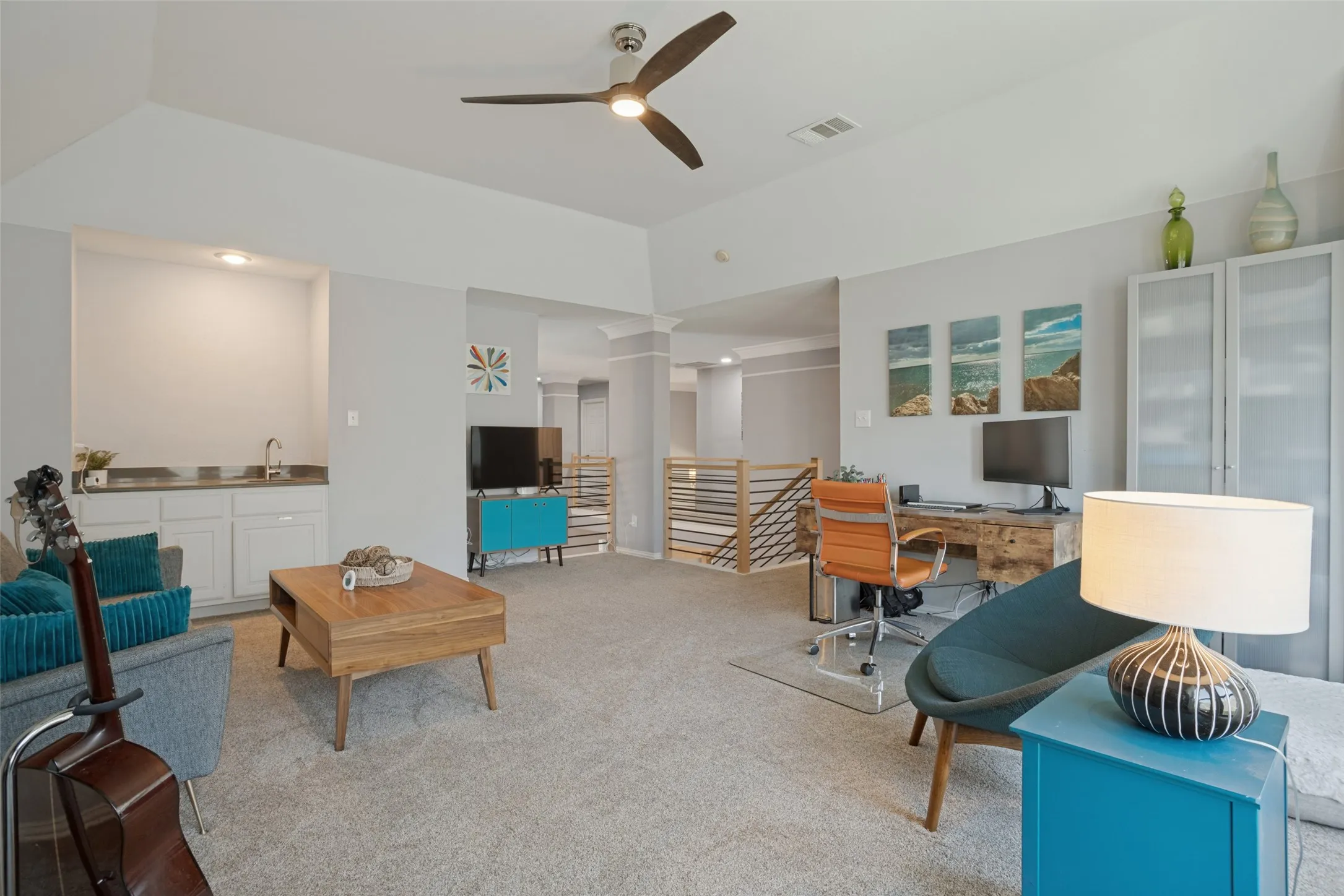 Game room with wet bar.