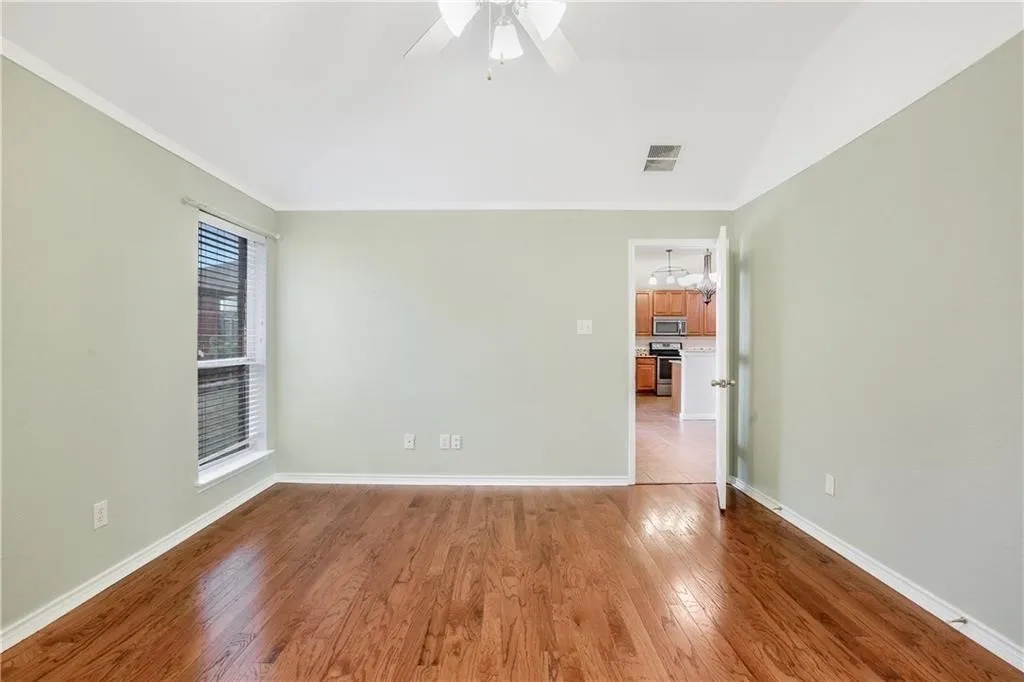 Hardwood-style flooring throughout