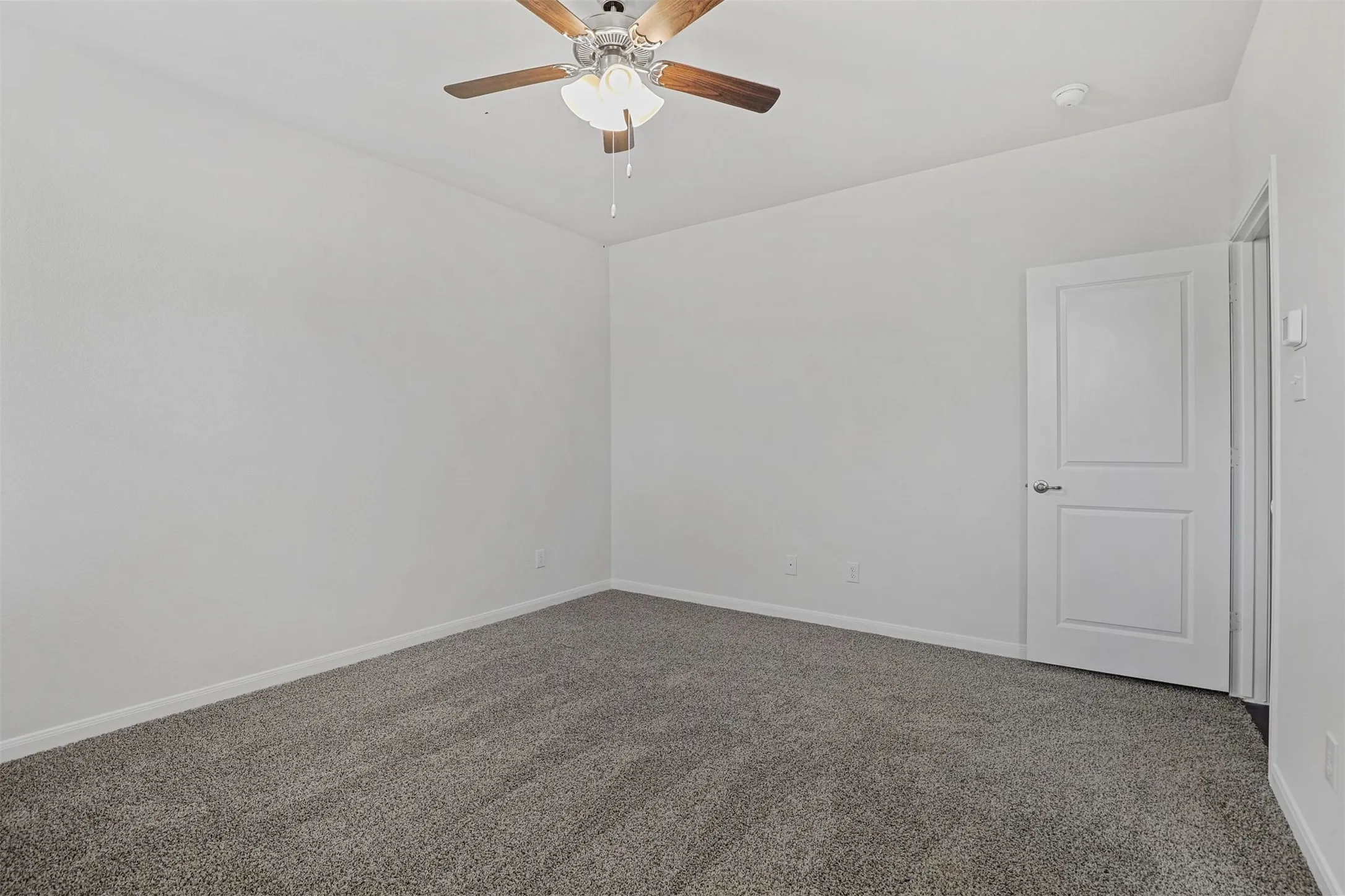 Recessed lighting and ceiling fan with wood-finish blades