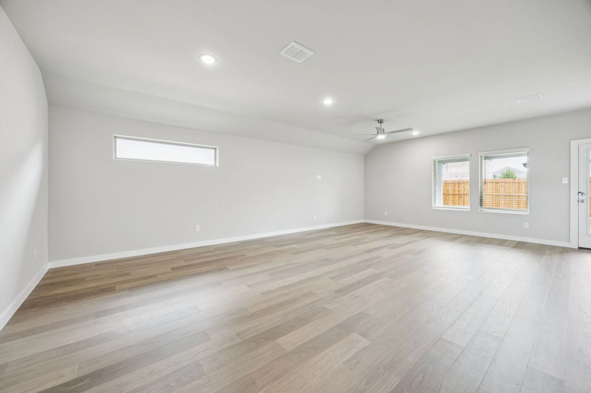 Dining and Living Room in the Hayden home plan – REPRESENTATIVE PHOTO