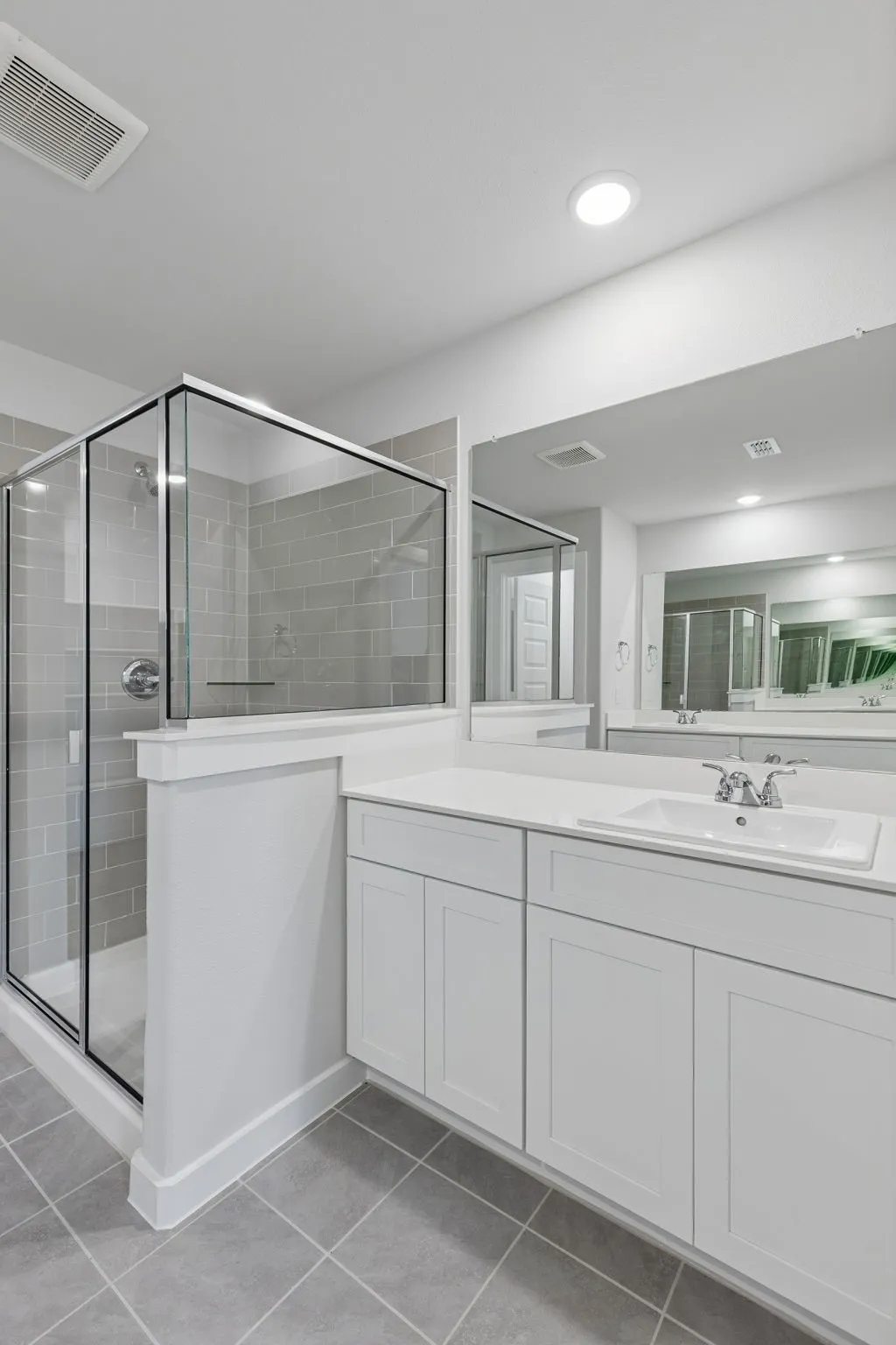 Primary Bathroom in the Harrison home plan – REPRESENTATIVE PHOTO