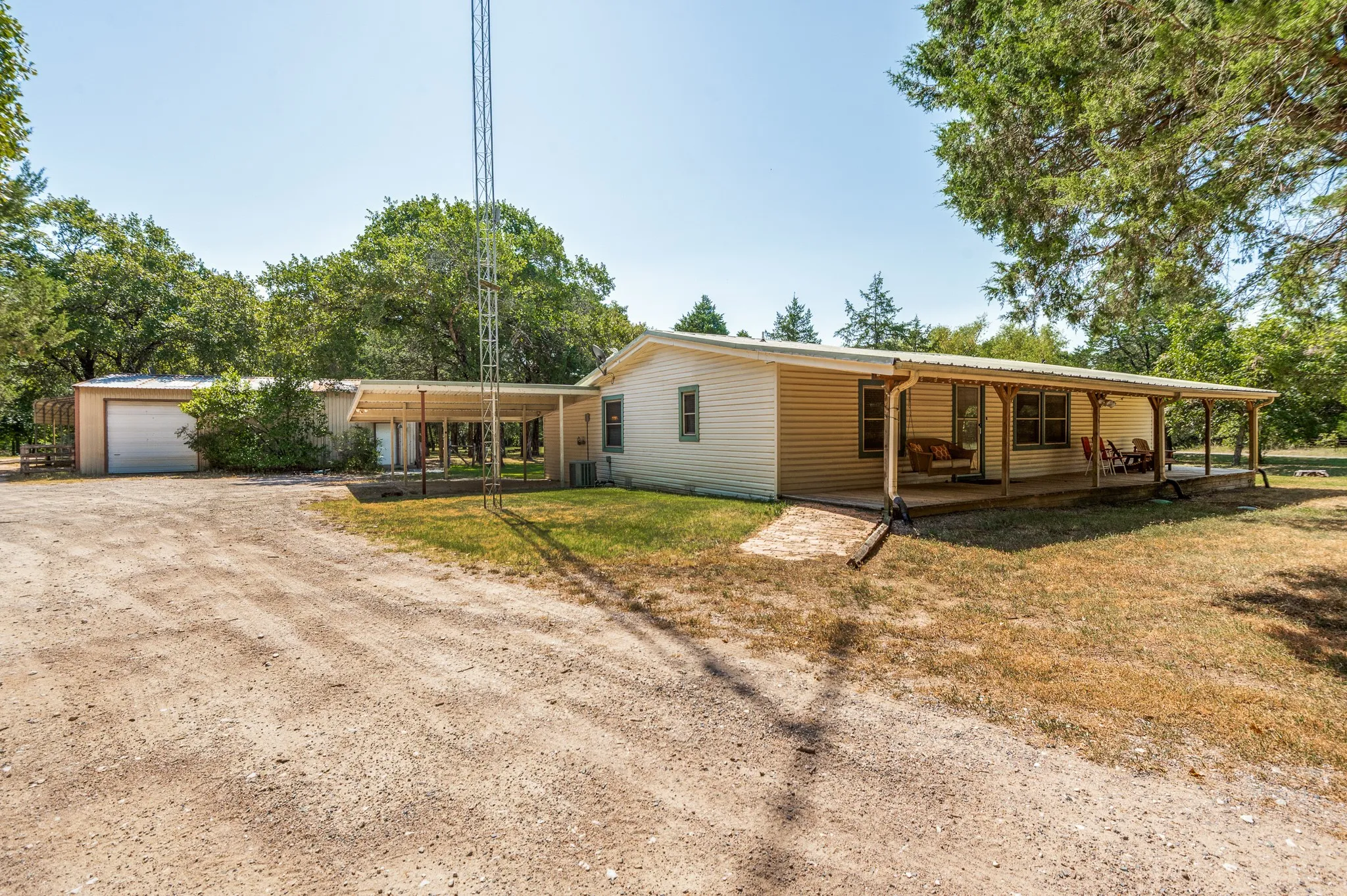 Main house (right) and garage and bunkhouse (left)